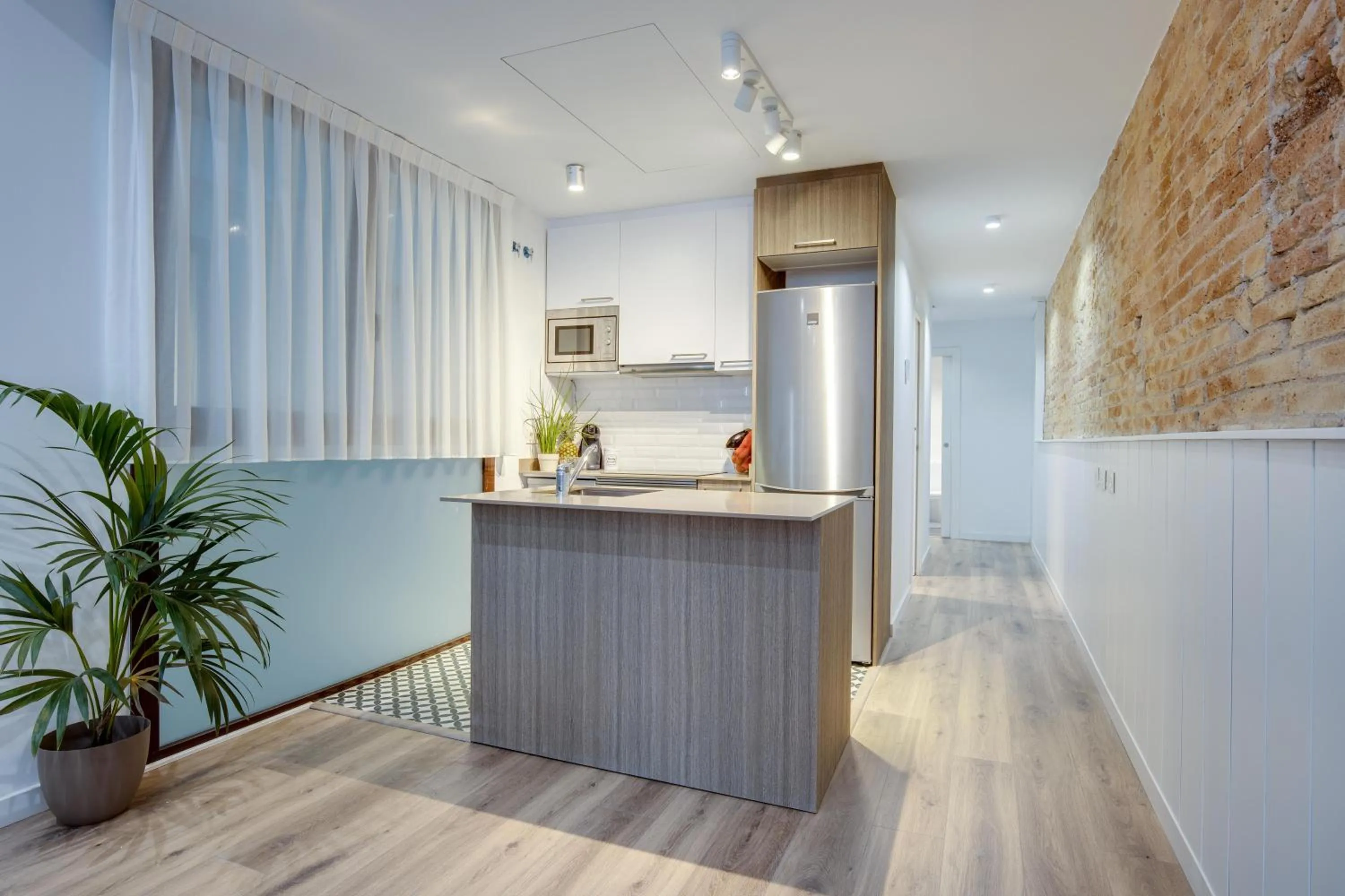 Kitchen or kitchenette in LucasLand Apartments Barcelona