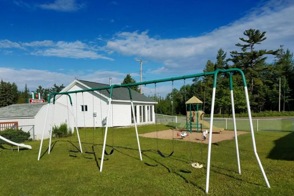 Children play ground in Mackinaw Budget Inn