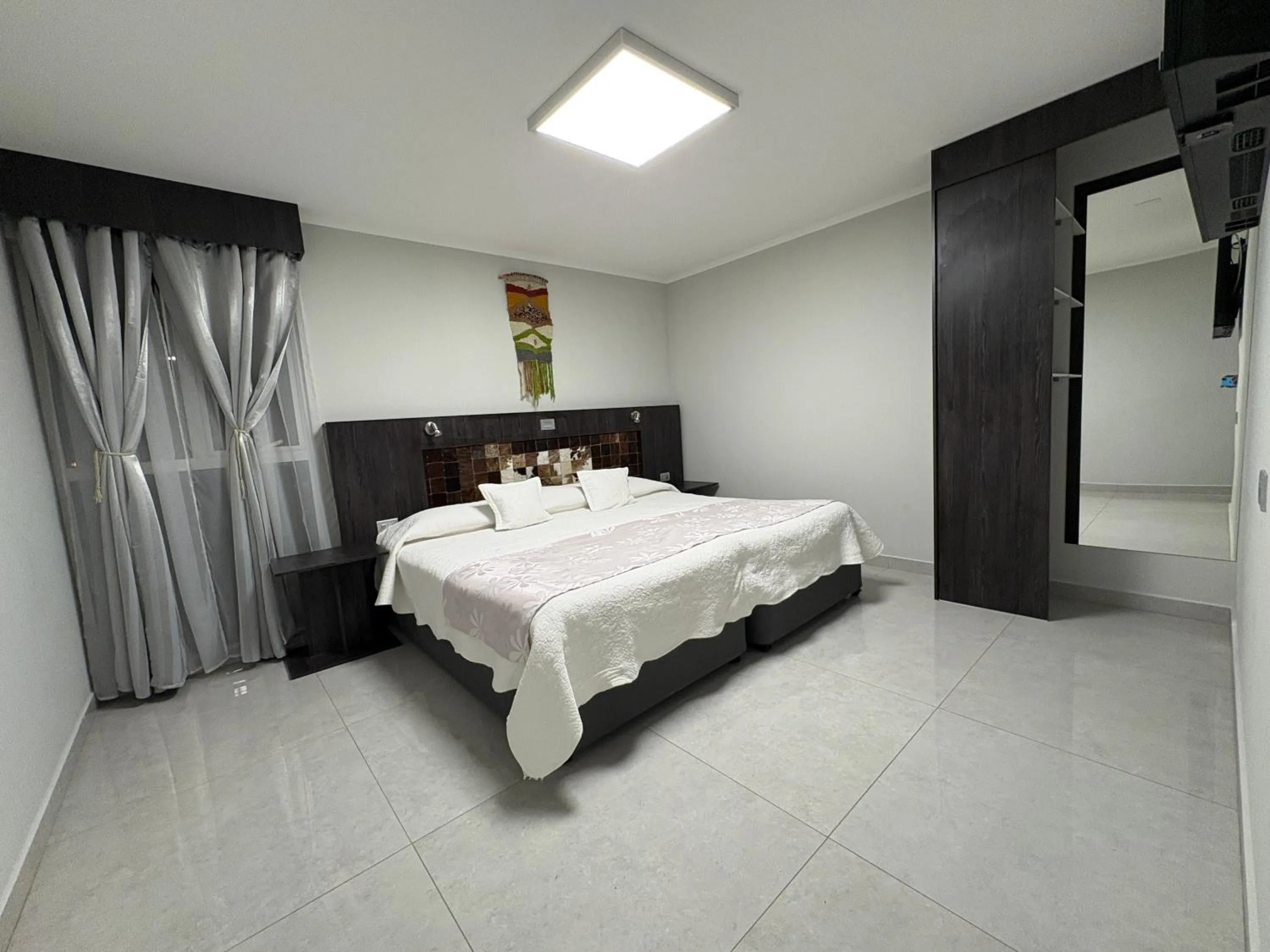 Photo of the whole room, Bed in Atankalama