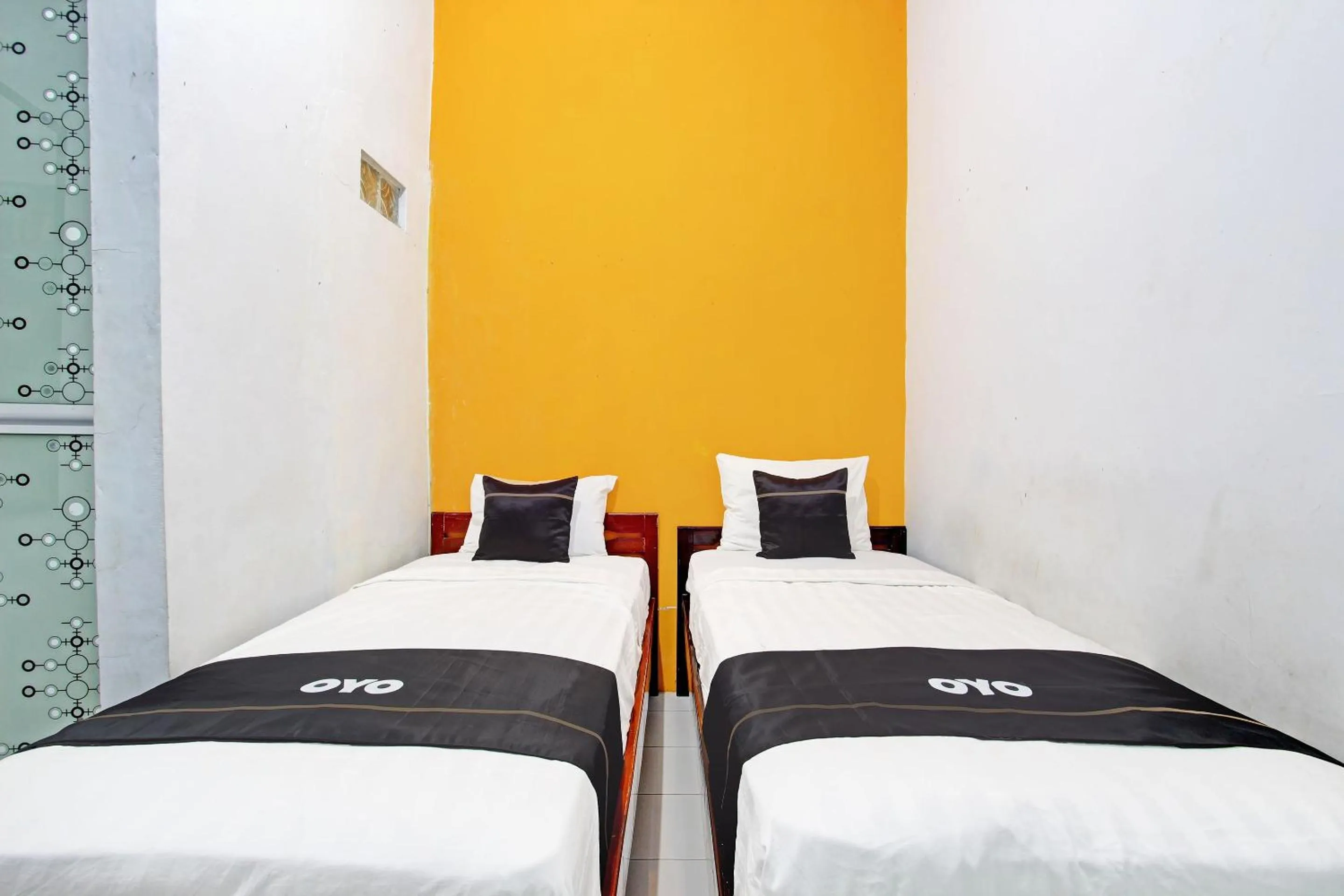 Bedroom, Bed in Capital O 92929 Hotel New Tirta Kencana Syariah