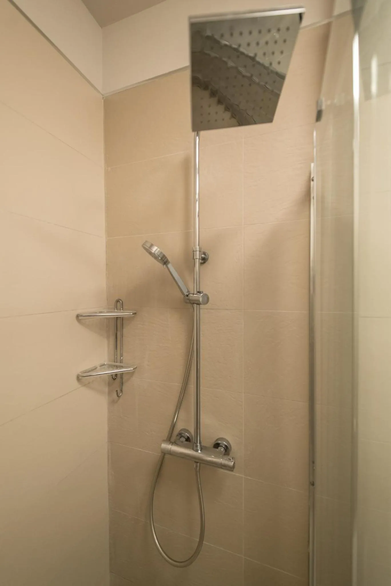 Shower in Expecto Apartments