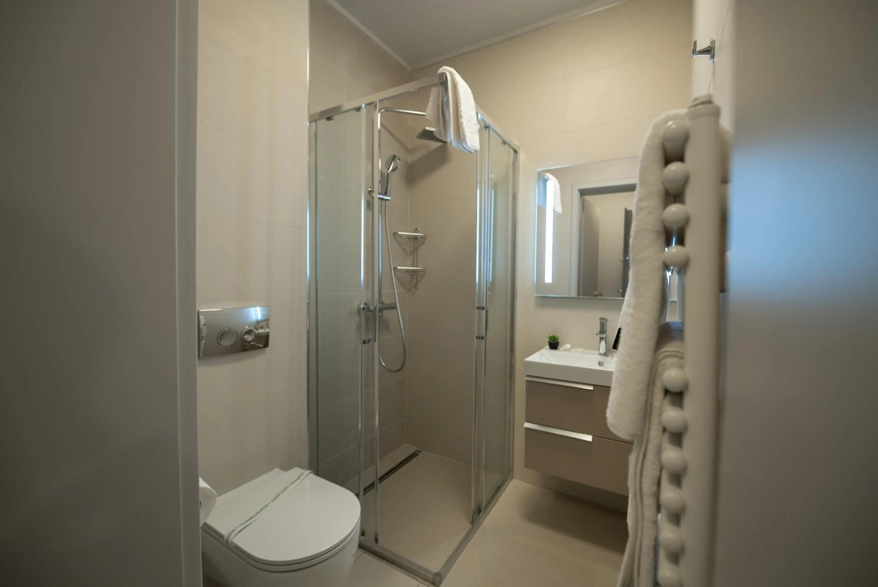 Shower in Expecto Apartments
