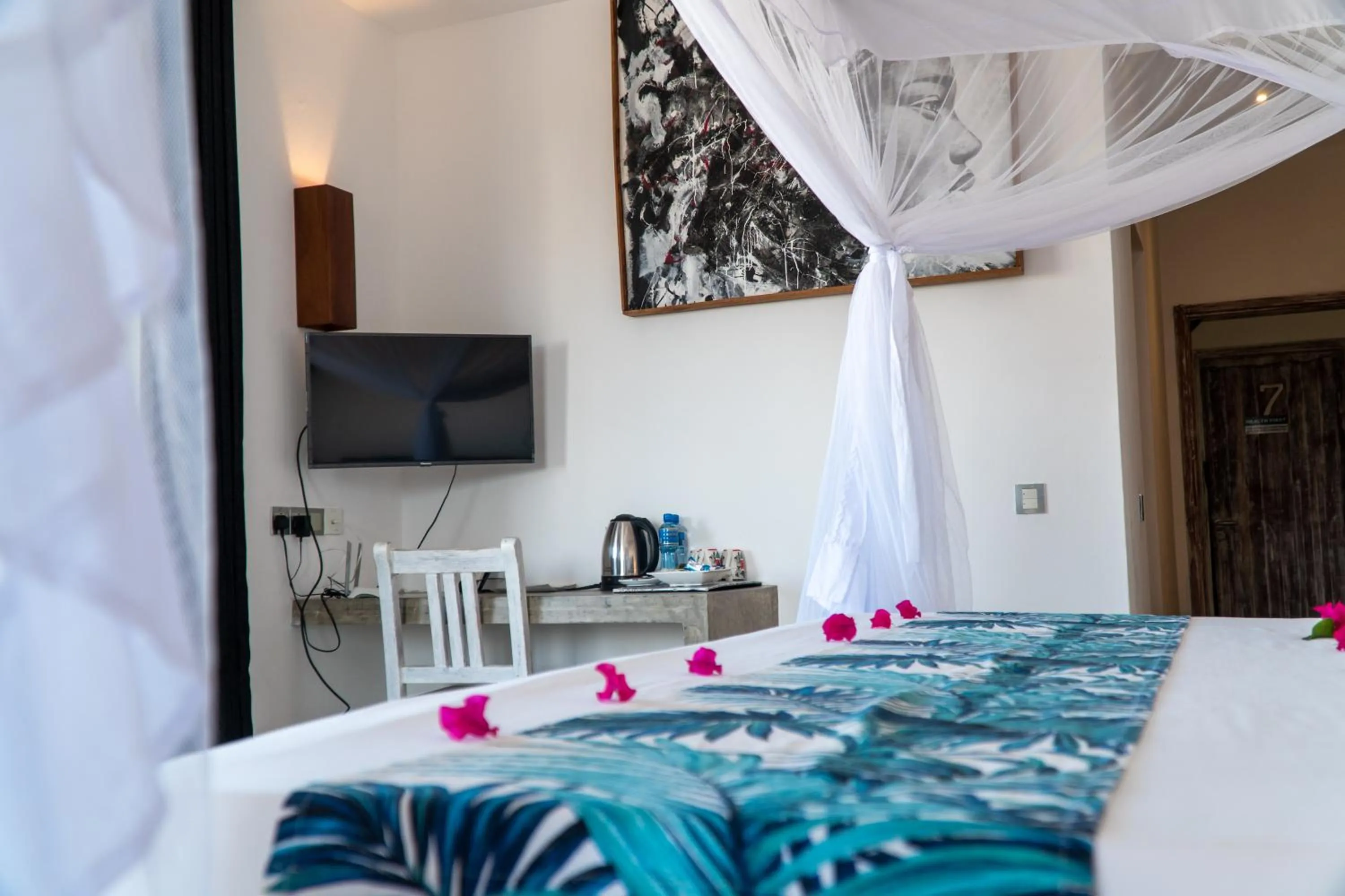 Photo of the whole room, Bed in Visiwa Beach Resort