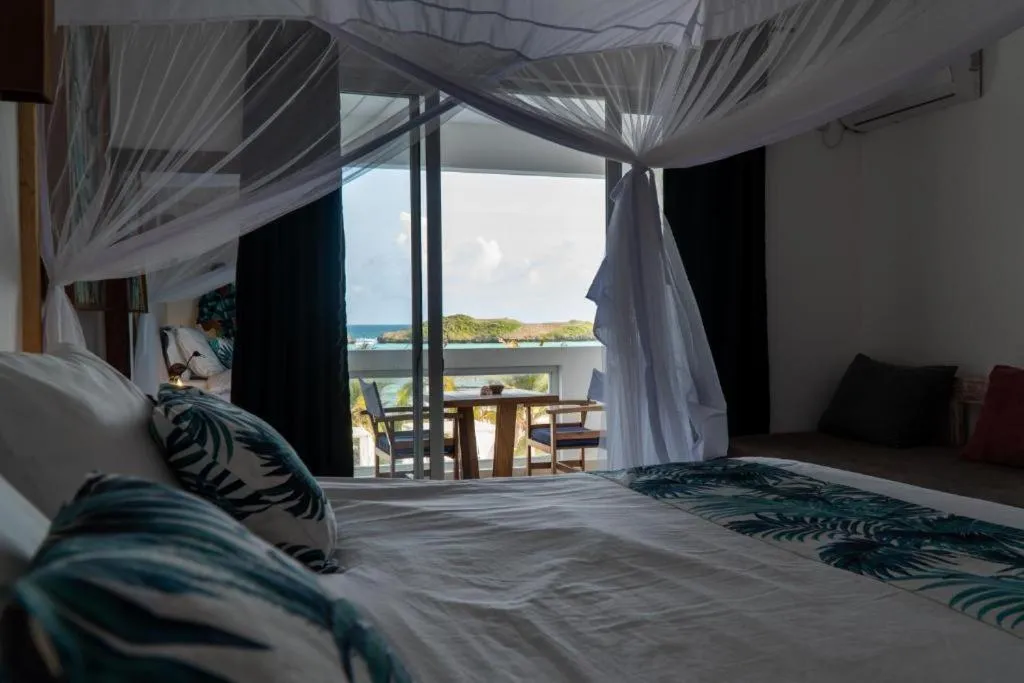 Photo of the whole room, Bed in Visiwa Beach Resort