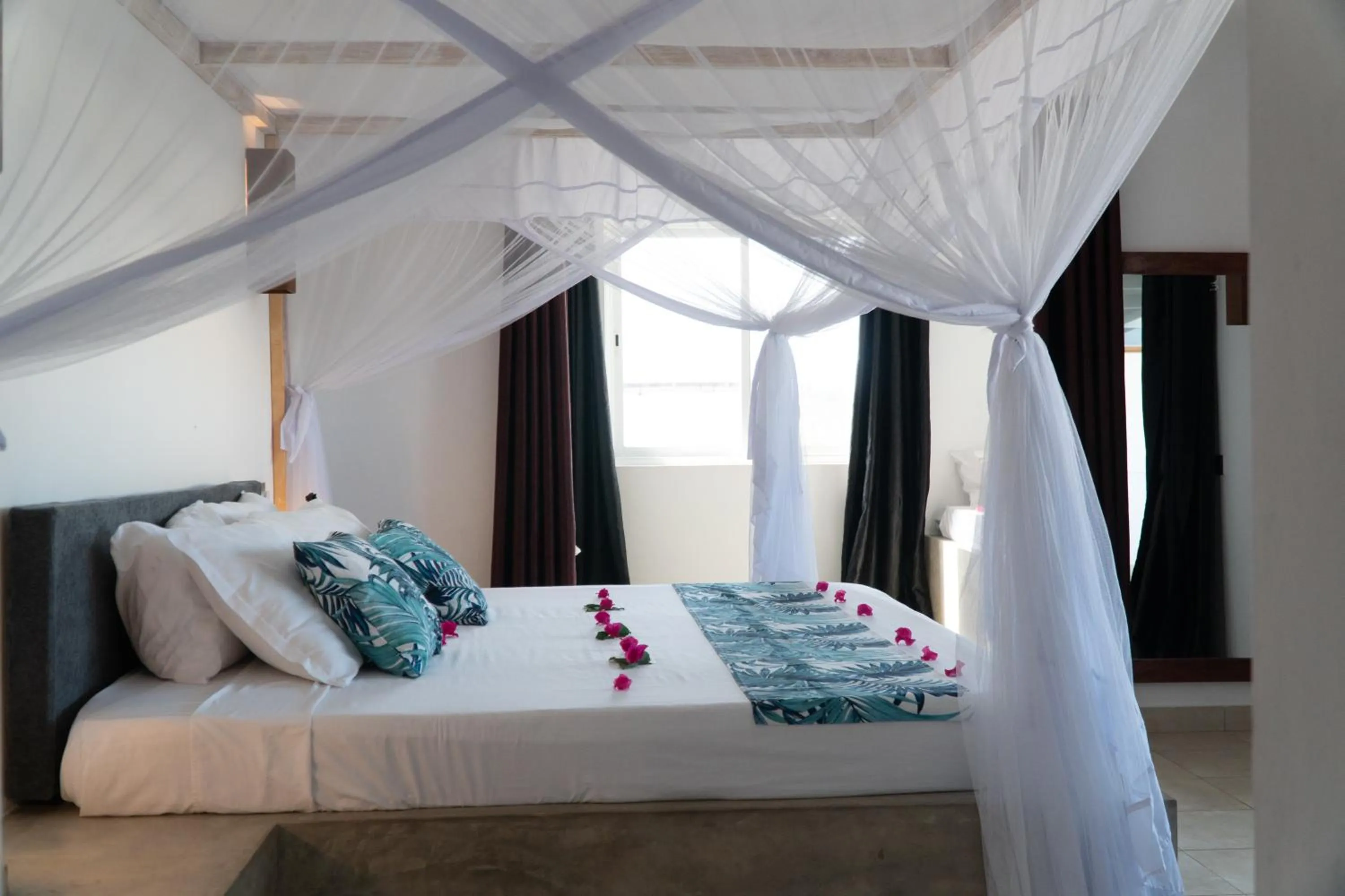 Photo of the whole room, Bed in Visiwa Beach Resort