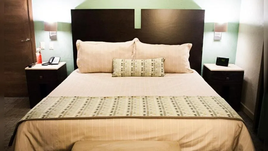 Bed in Hotel Coral & Marina