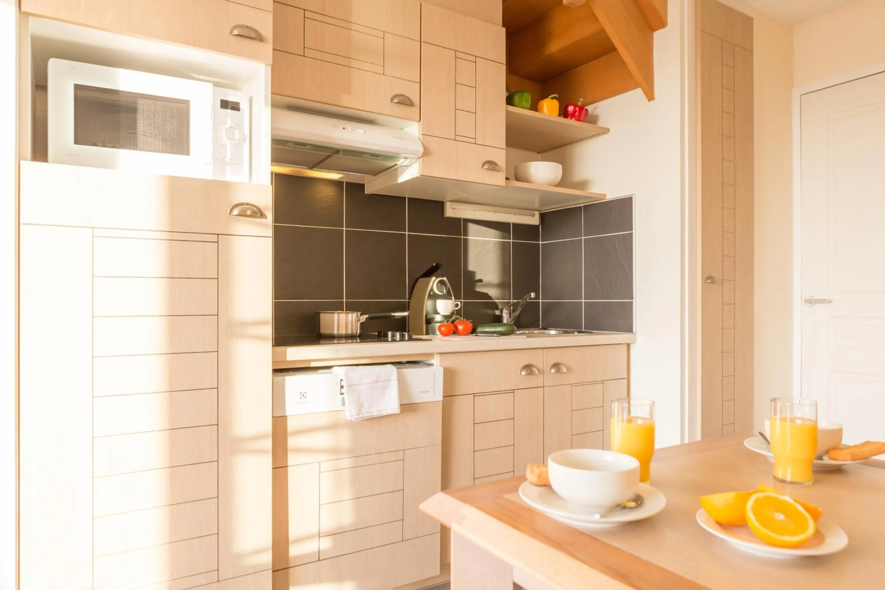 Kitchen or kitchenette in Pierre & Vacances Premium Résidence de la Plage