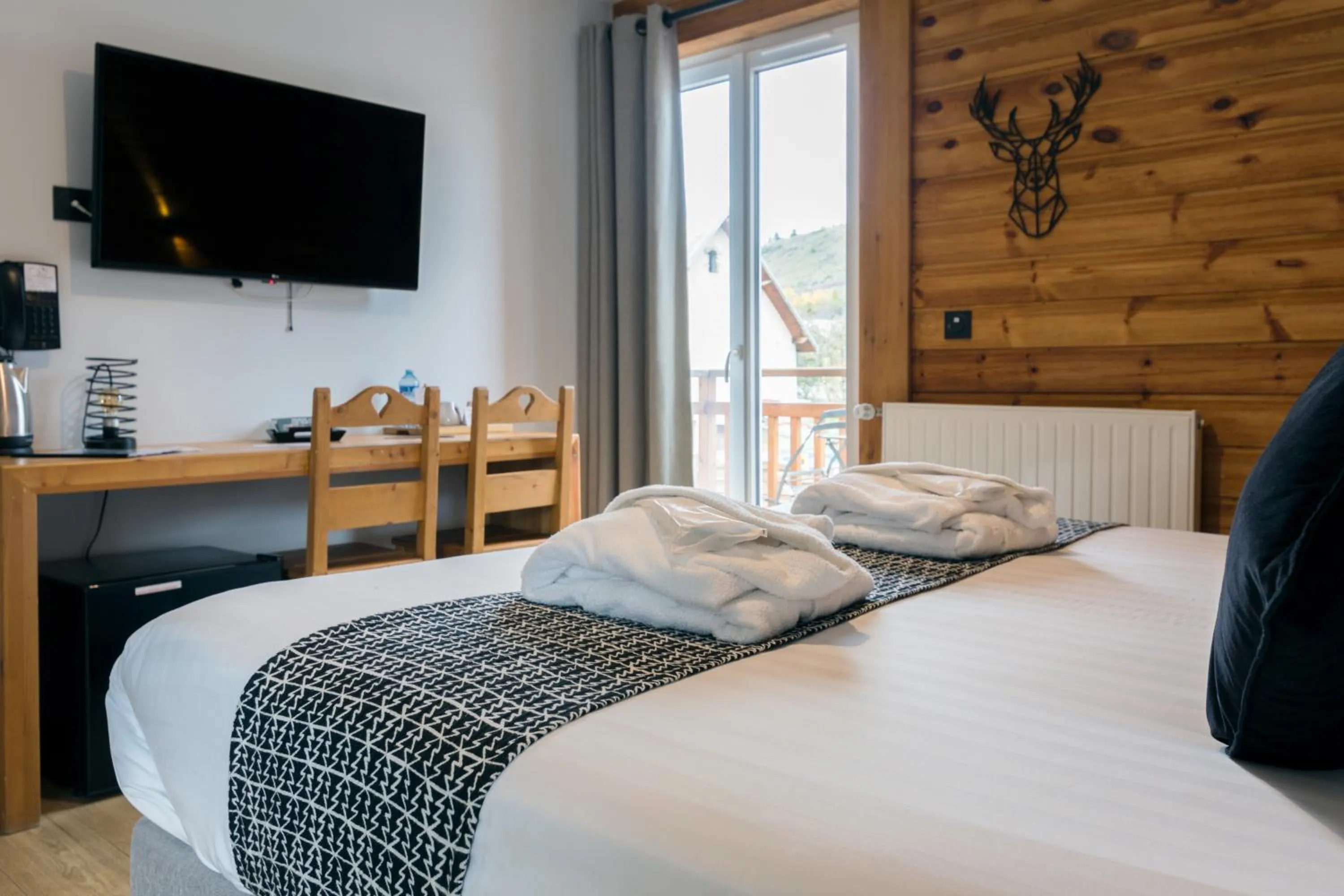 Bedroom, Bed in Logis Hôtel Les Autanes & Spa