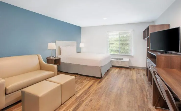 Bed in WoodSpring Suites Lackland near Sea World