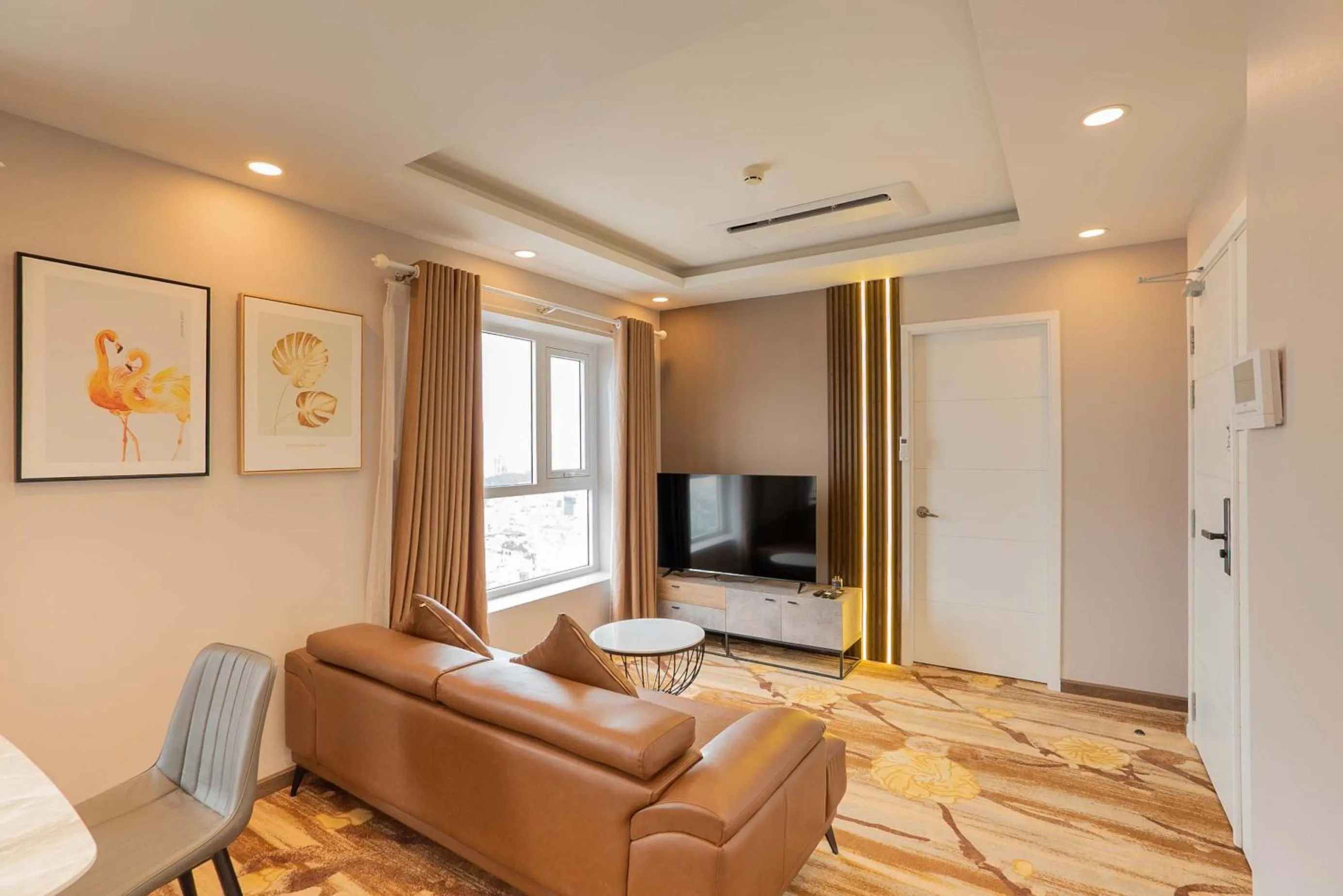 Living room in La Vela Saigon Hotel