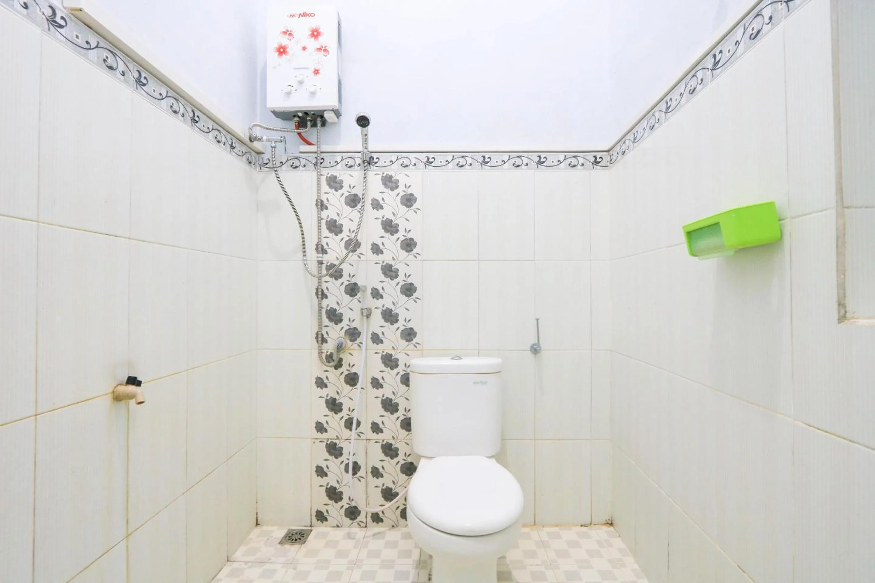 Bathroom in Hotel O Wallet Family Residence Syariah