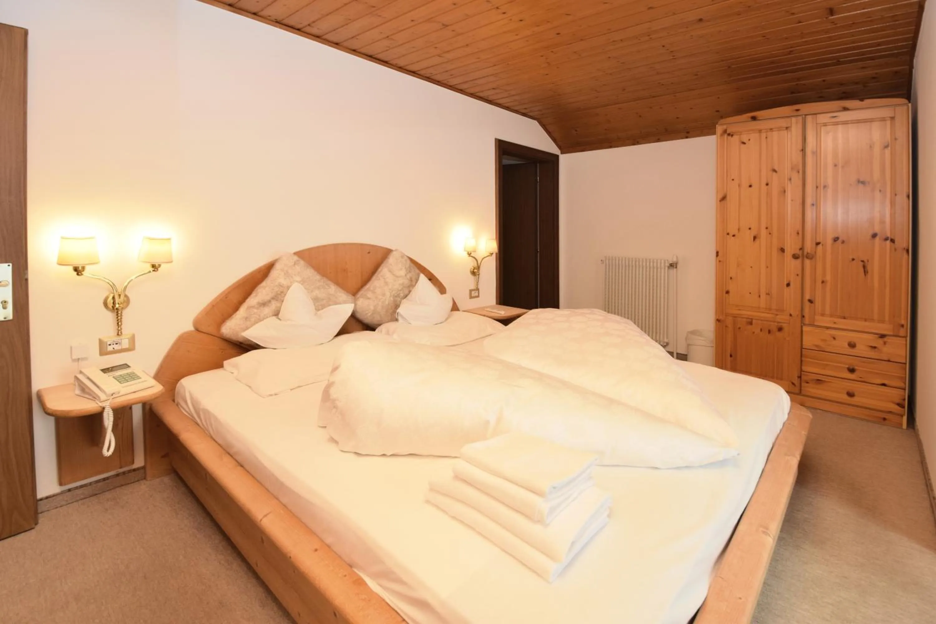 Bed in Hotel Chalet Olympia