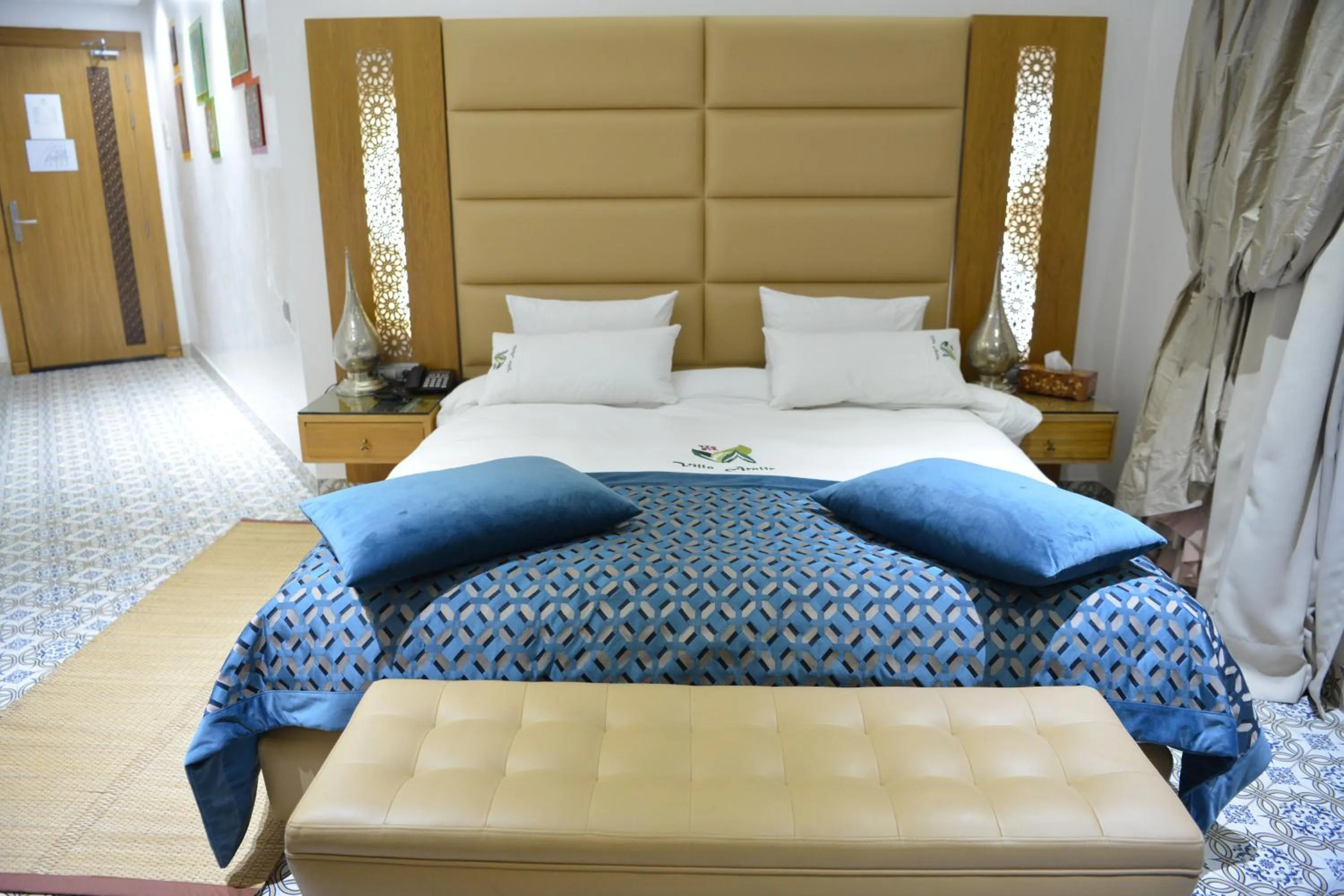 Bed in Aralia Boutique Hôtel