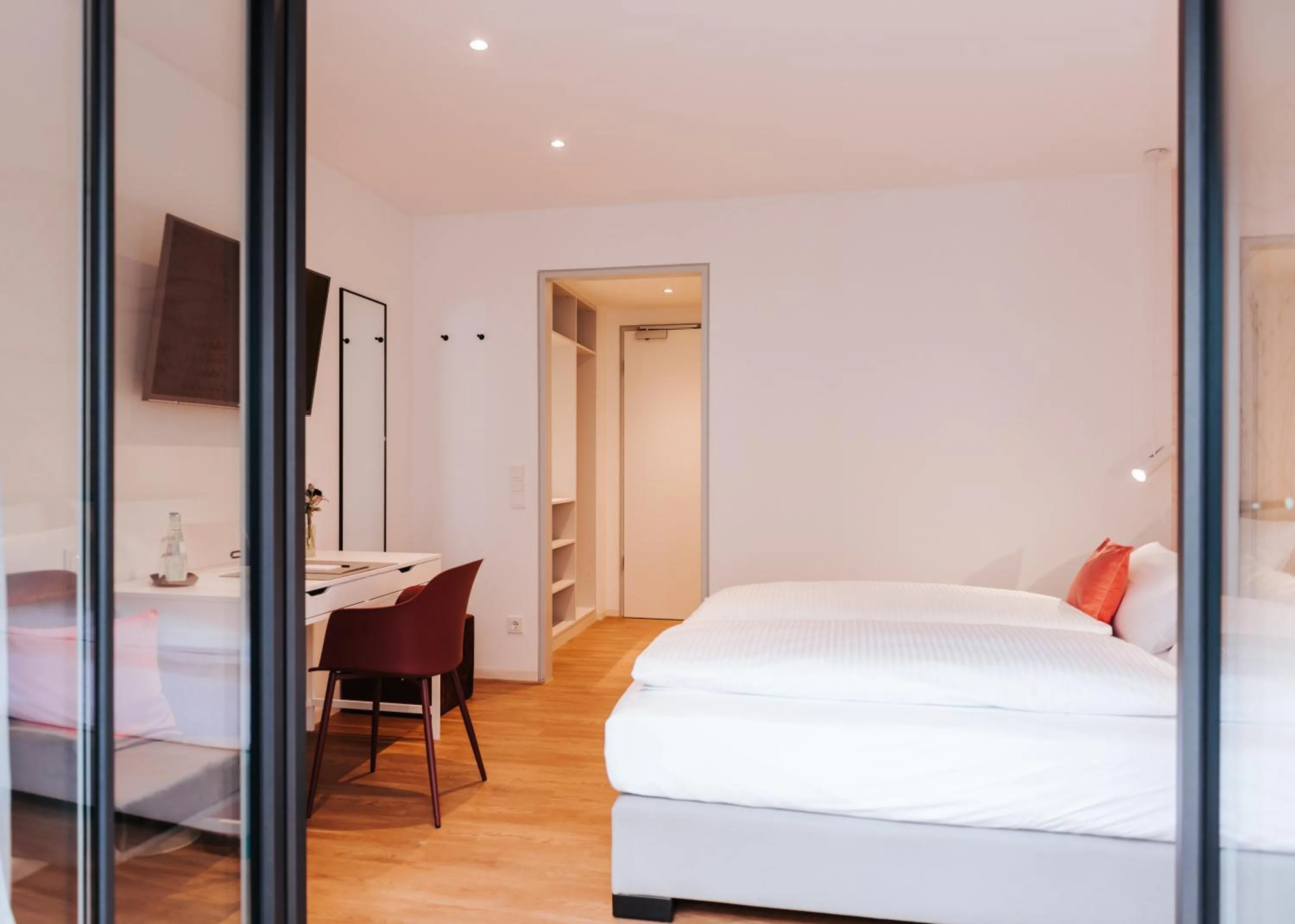 Bed in HAIMHAUSERS Hotel Garni