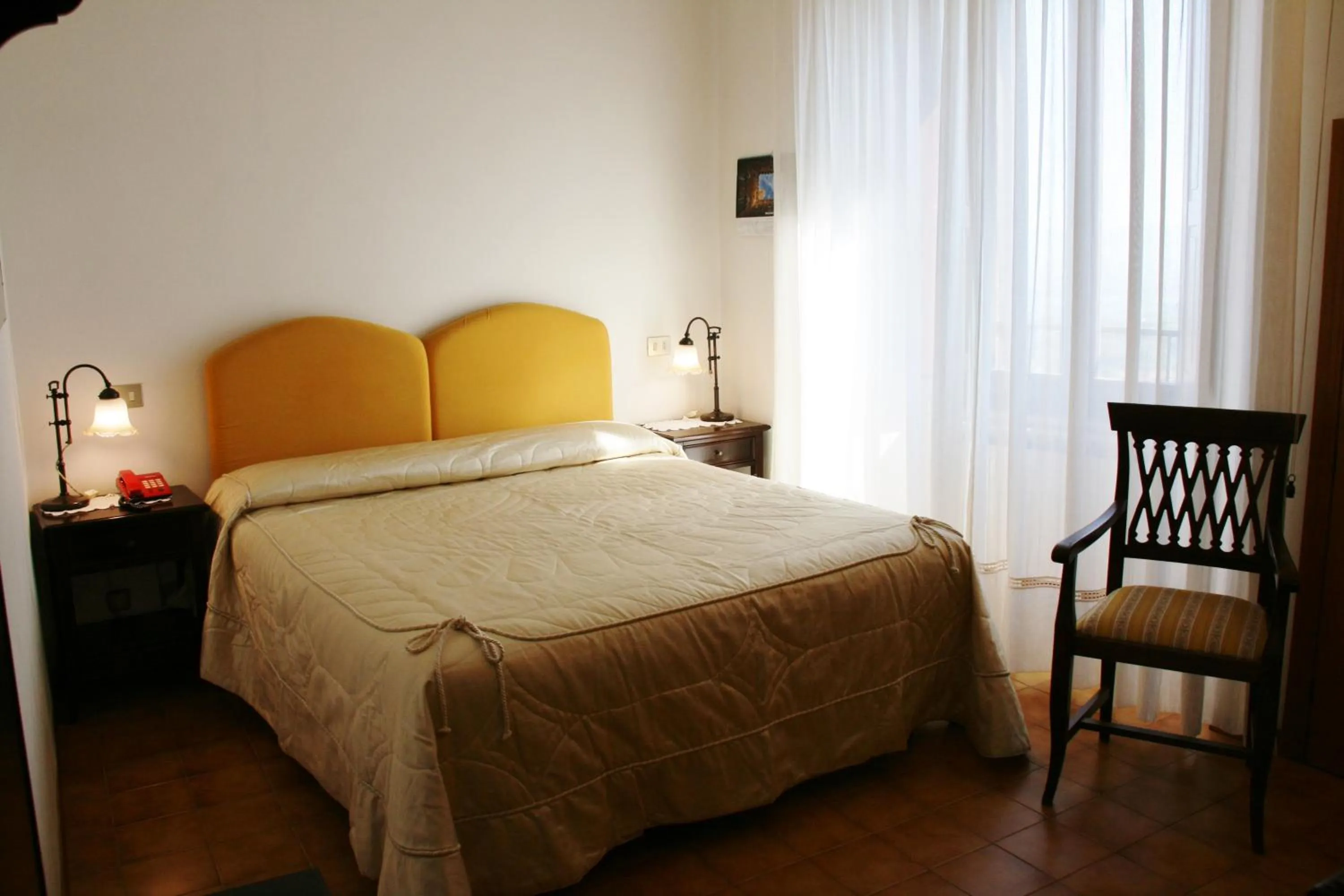 Photo of the whole room, Bed in Meublé il Riccio