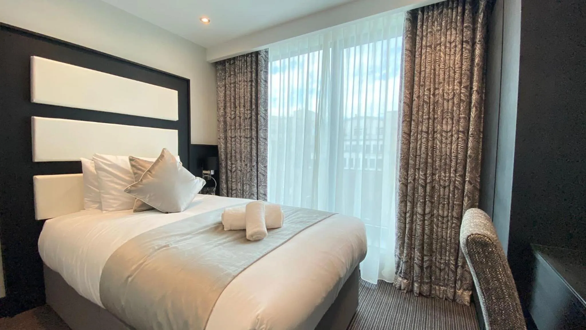 Bed in Hatton Garden Hotel