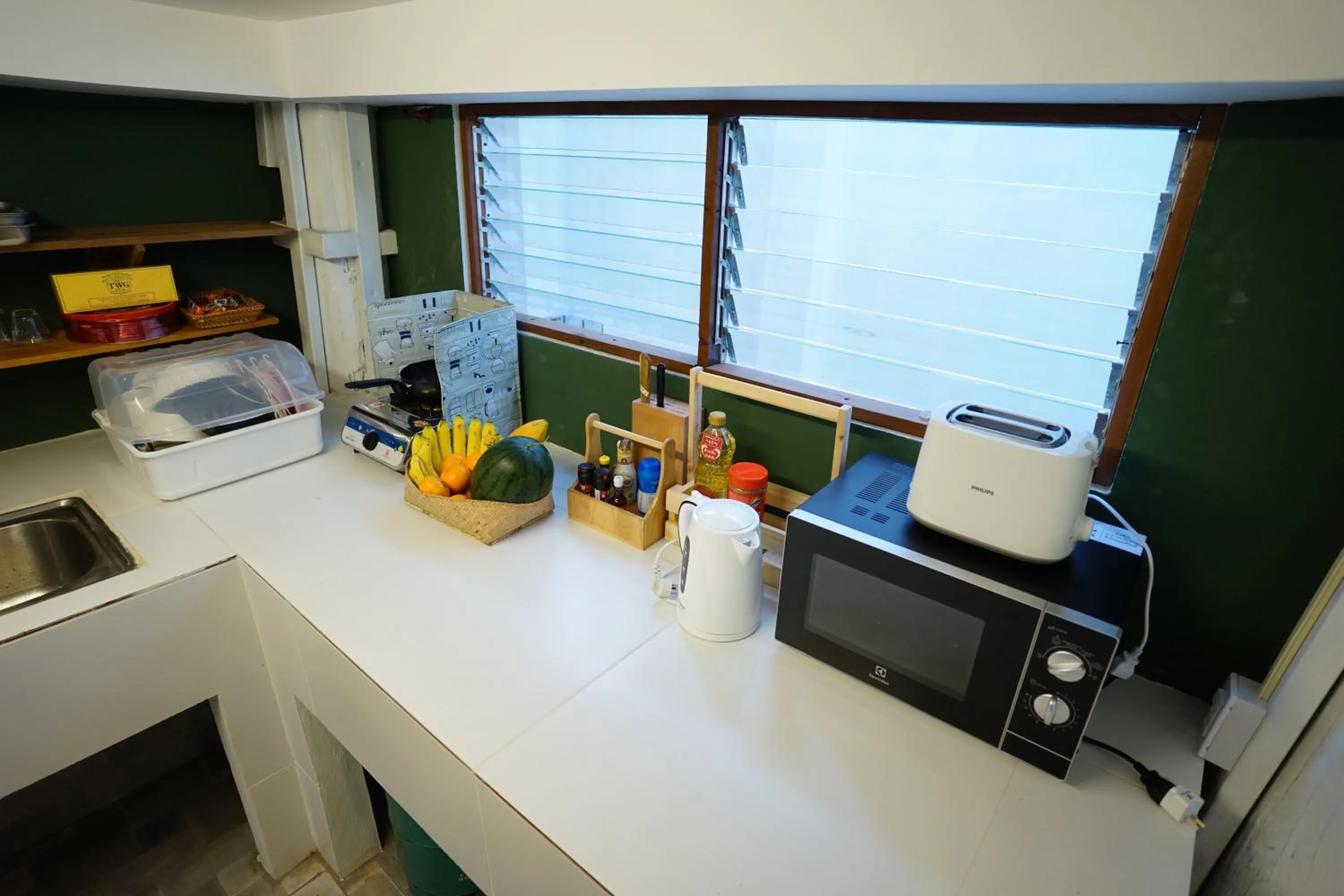 Kitchen or kitchenette in Barn Laos Hostel