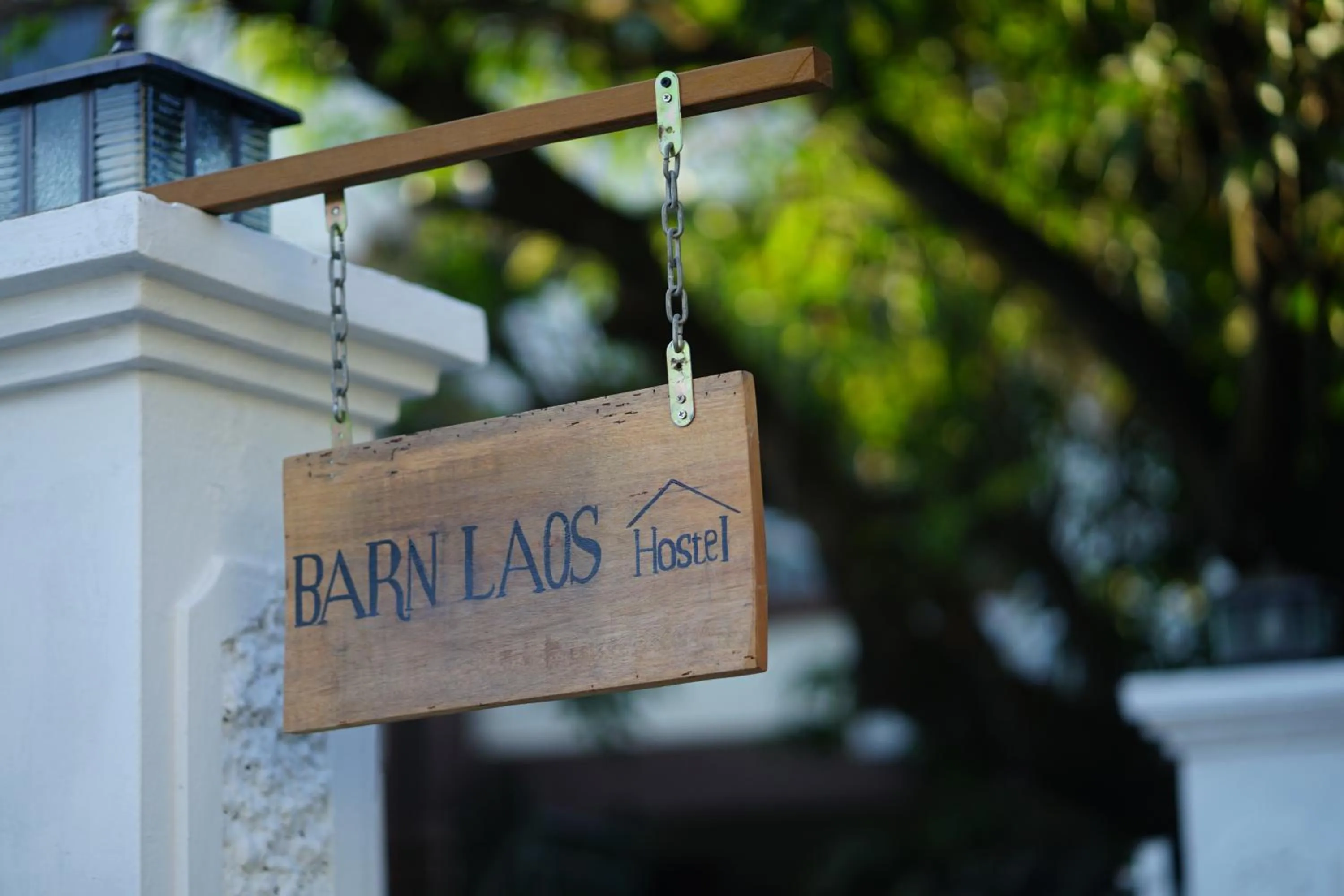 Property logo or sign in Barn Laos Hostel