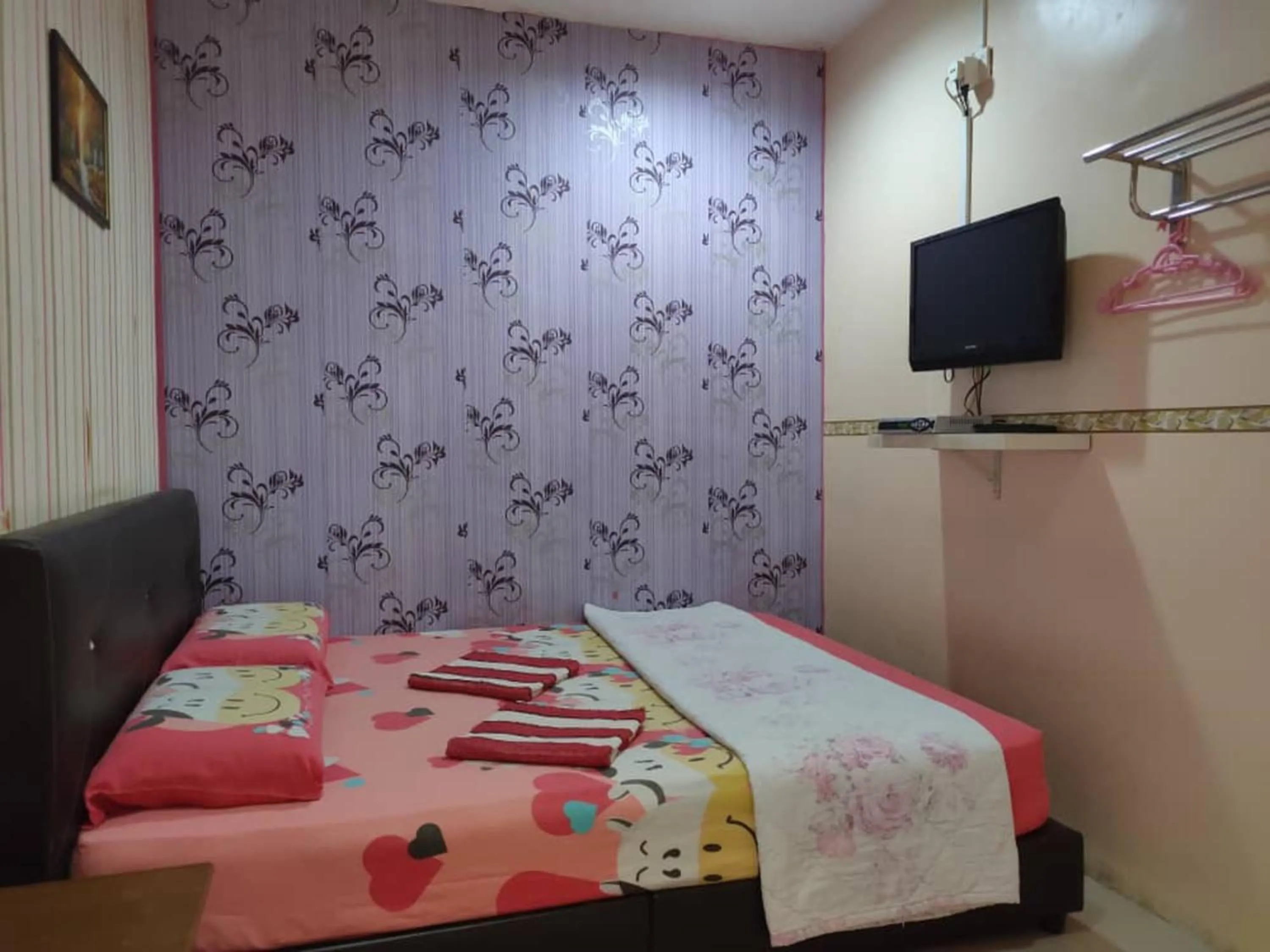 Bed in Hotel Sri Bahau