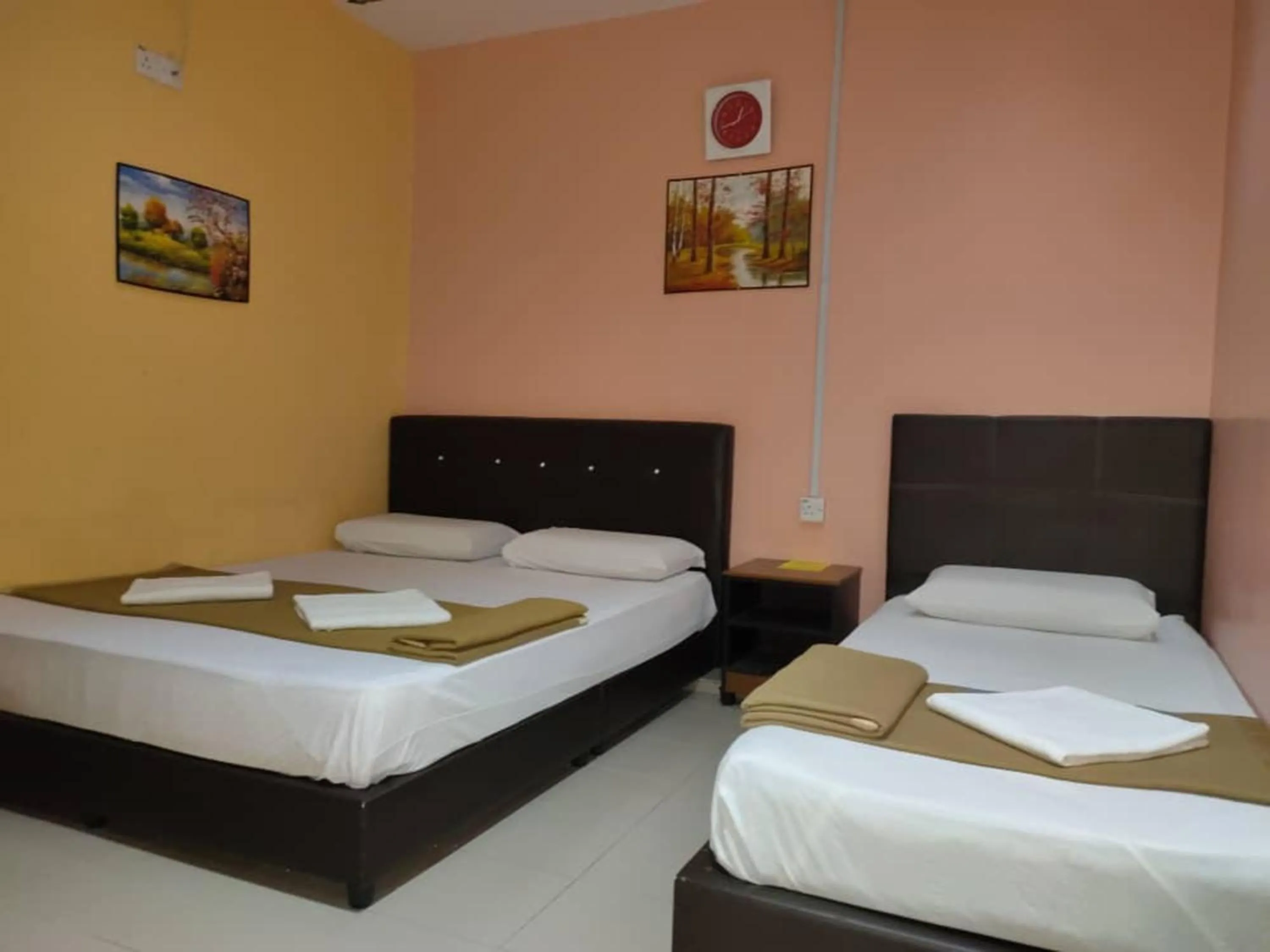 Bed in Hotel Sri Bahau