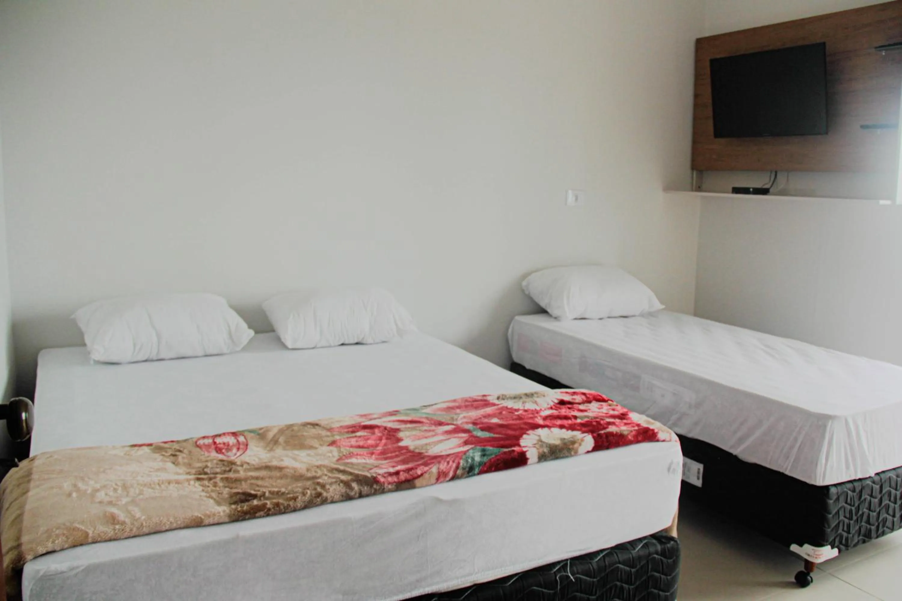 Photo of the whole room, Bed in Souza Reis Apart - Unidade 1