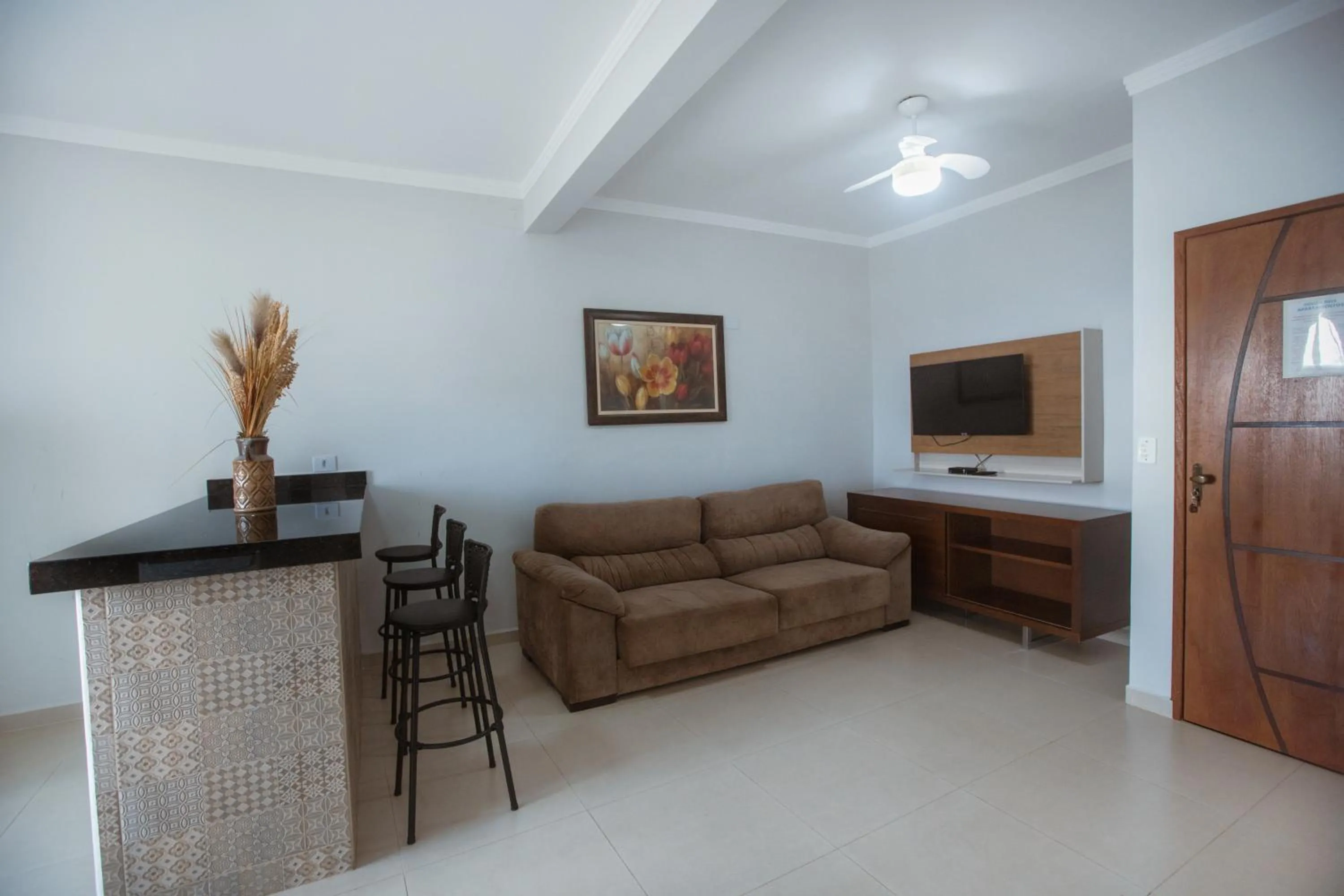 Communal lounge/ TV room in Souza Reis Apart - Unidade 1