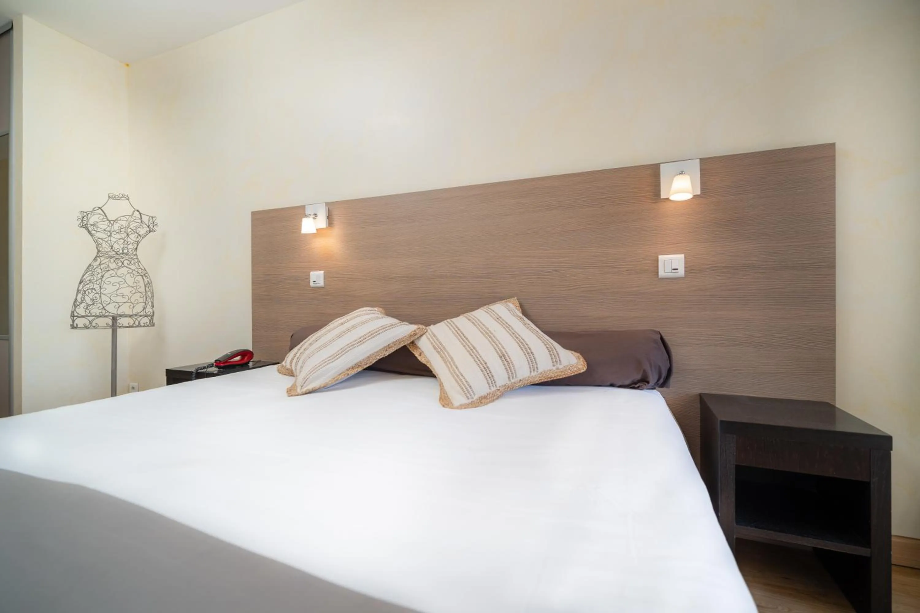 Bed in Hôtel Beau Soleil