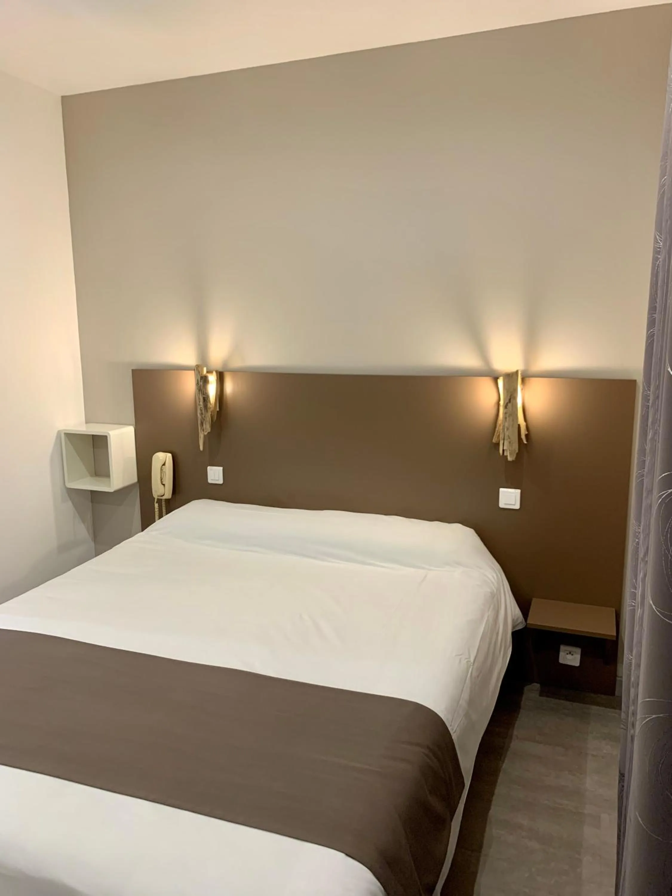 Bed in Hôtel Beau Soleil