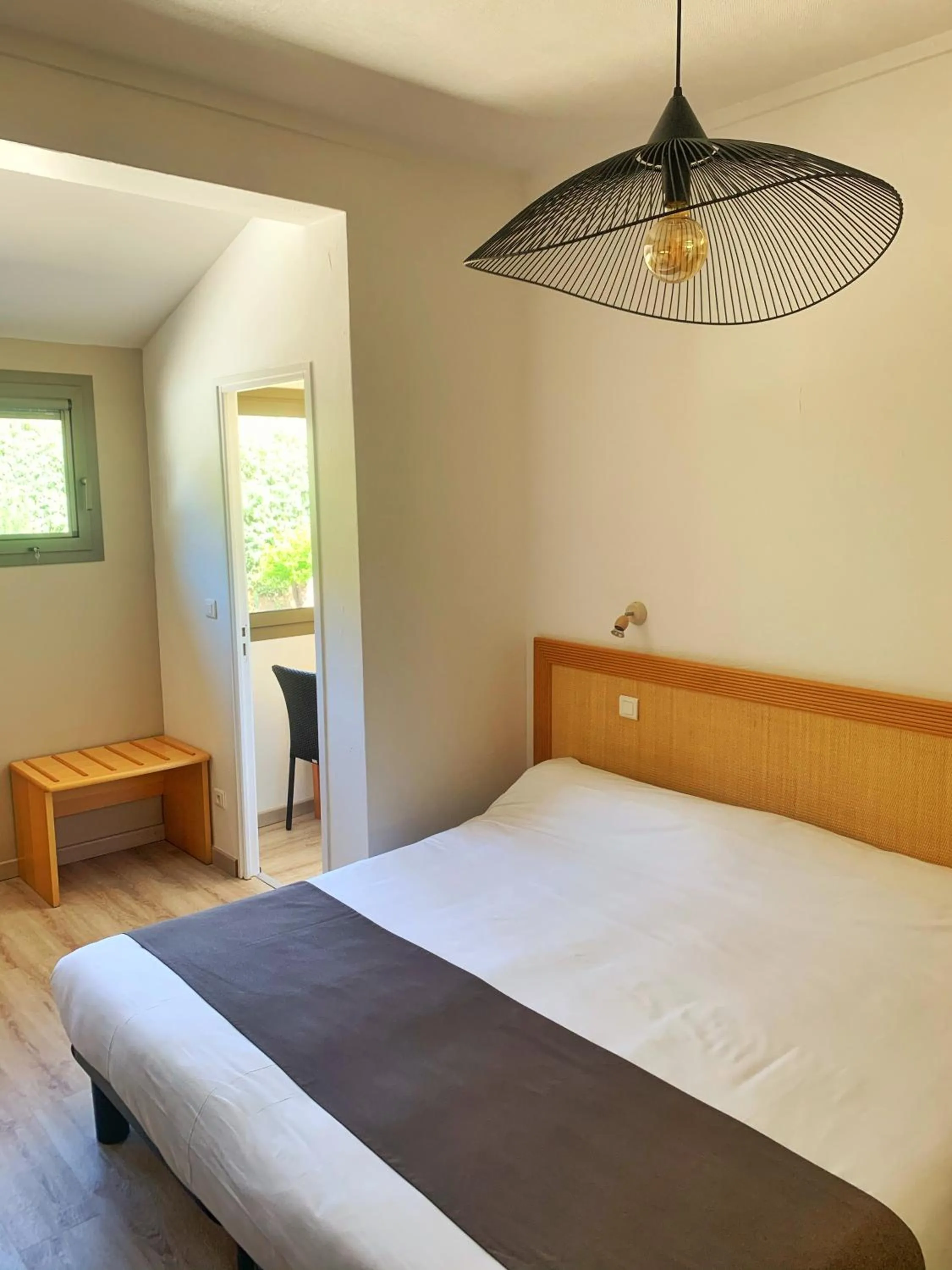 Bed in Hôtel Beau Soleil