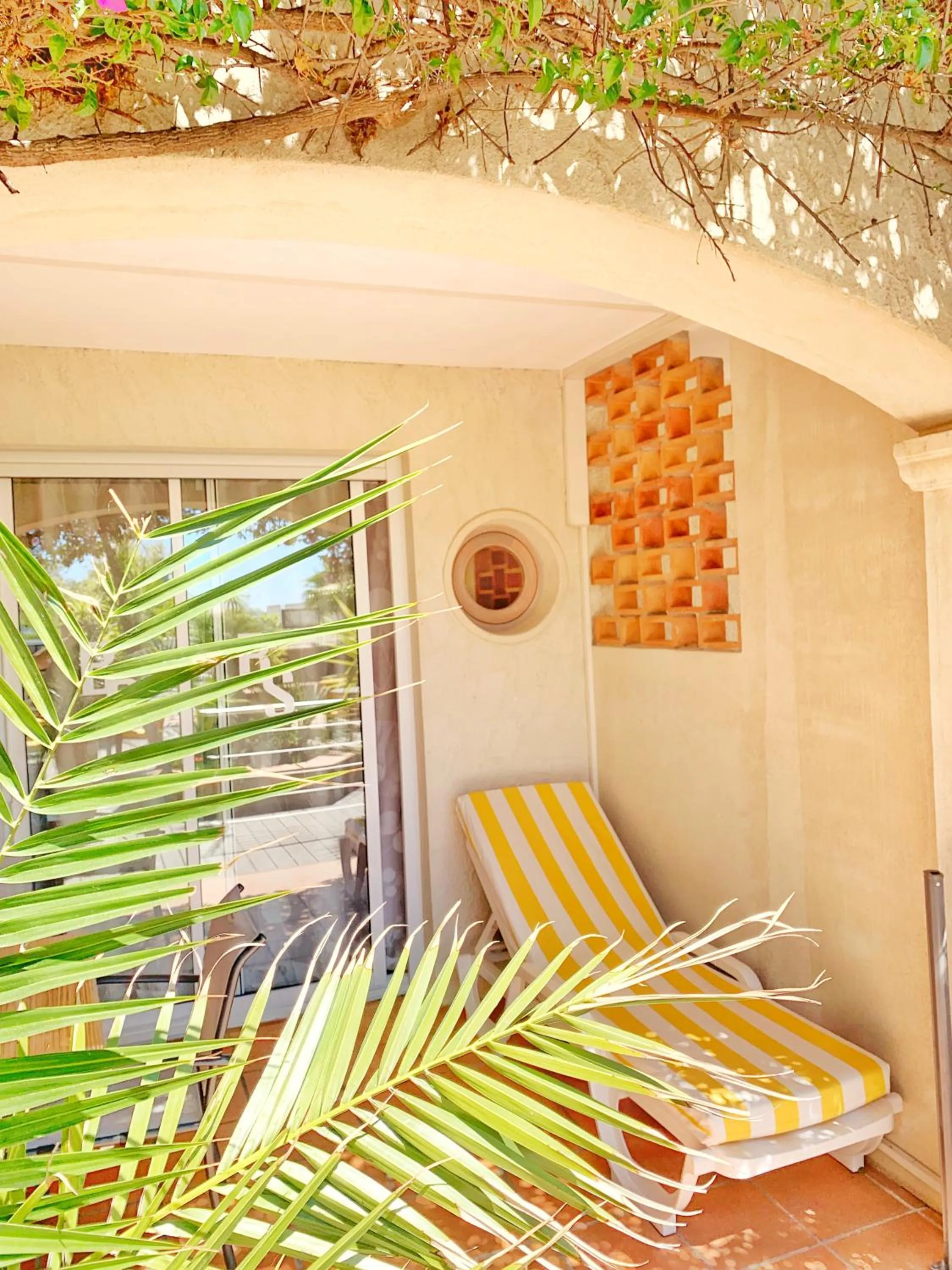 Garden view in Hôtel Beau Soleil