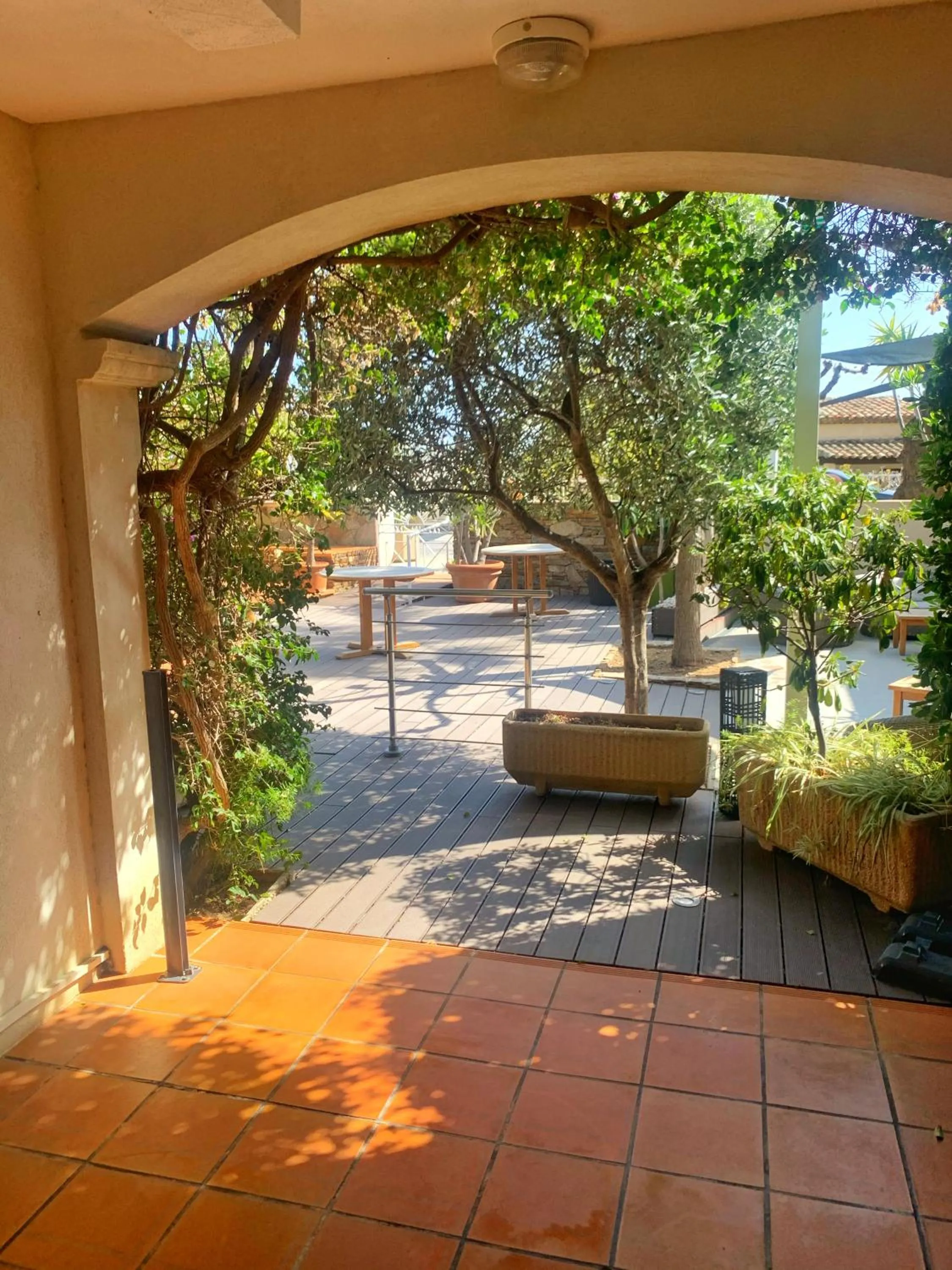 Garden view in Hôtel Beau Soleil