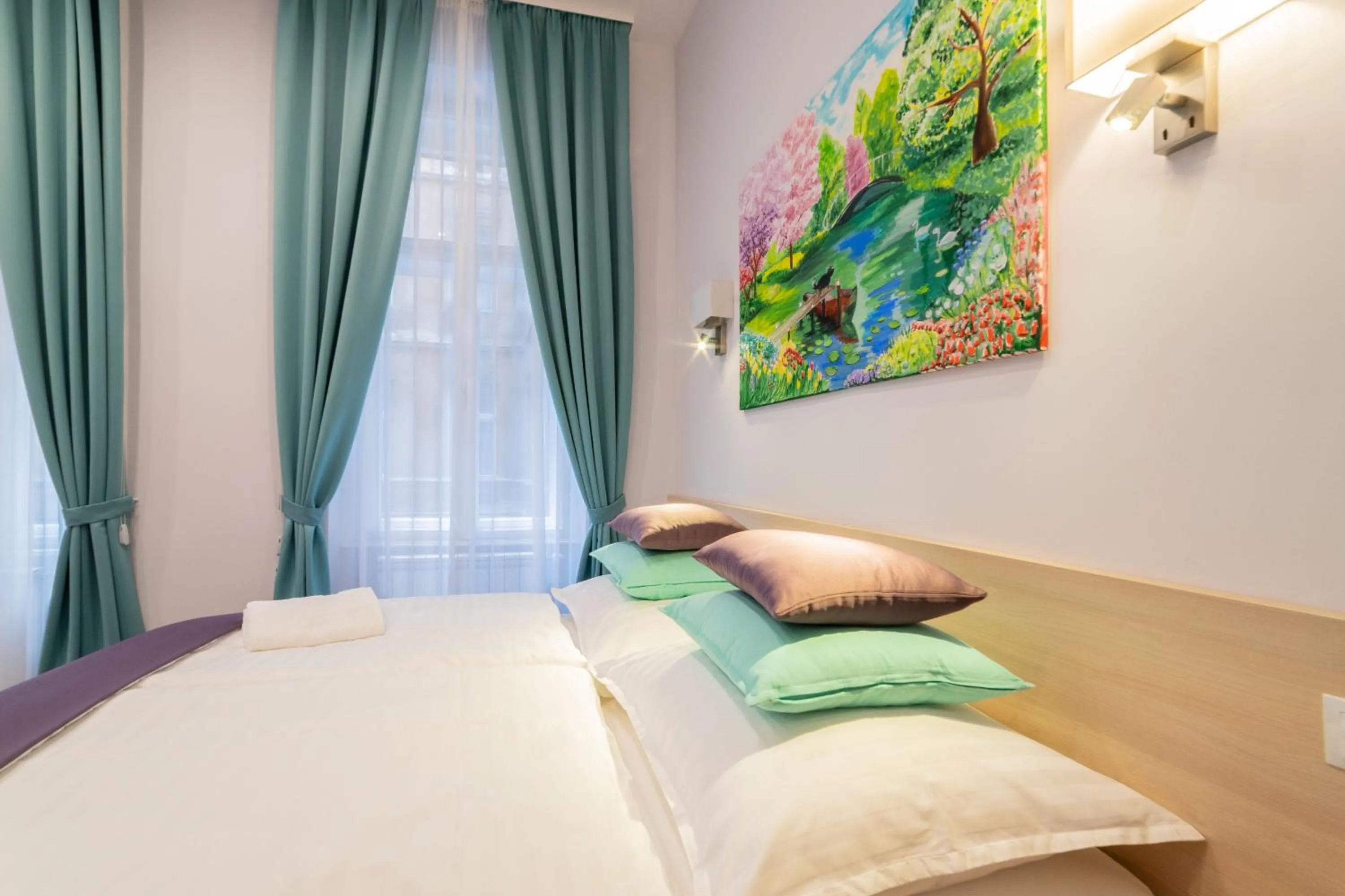 Bed in Global Suites Budapest