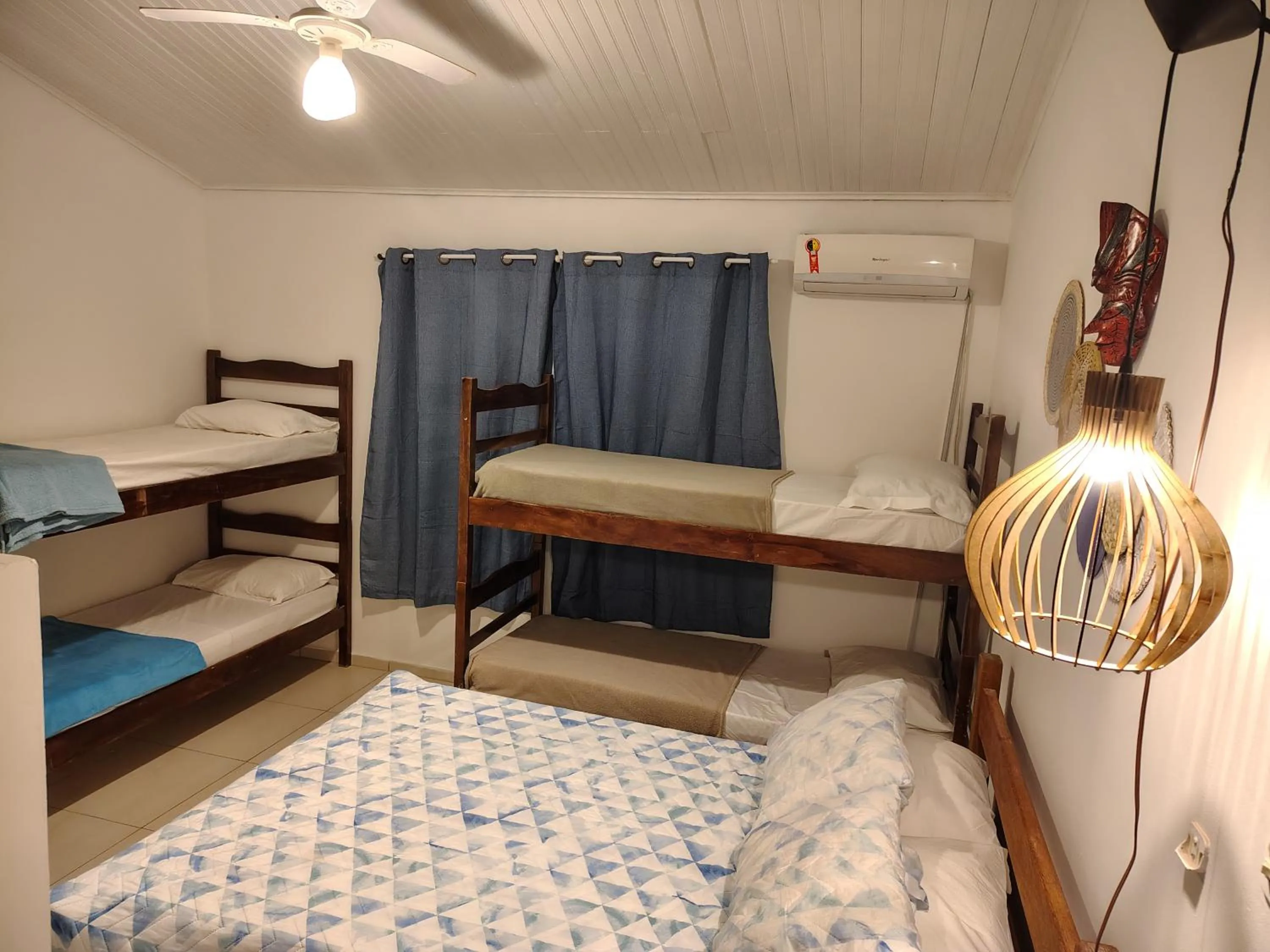 Bed in Villa Bali Maresias Lofts