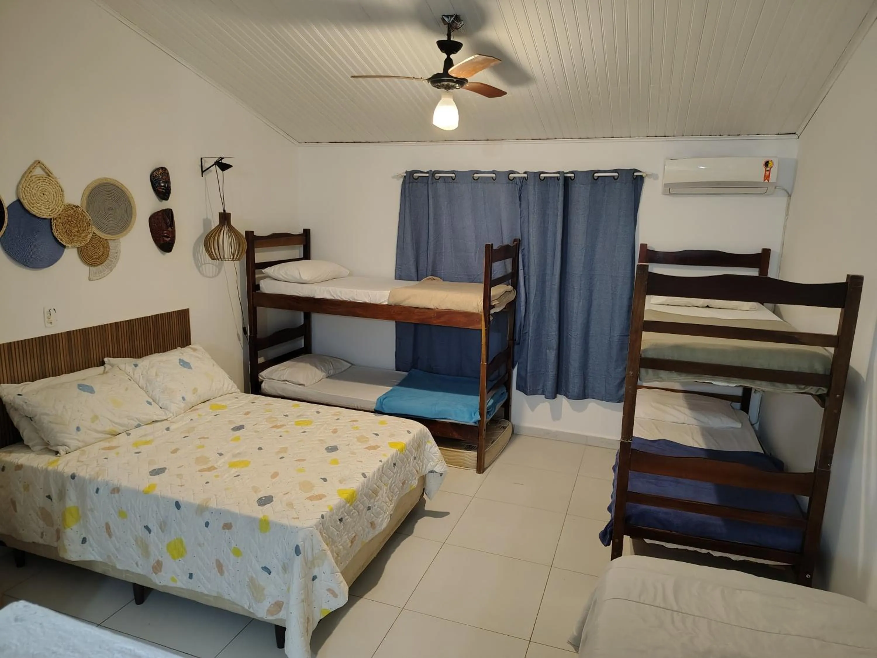 Bed in Villa Bali Maresias Lofts