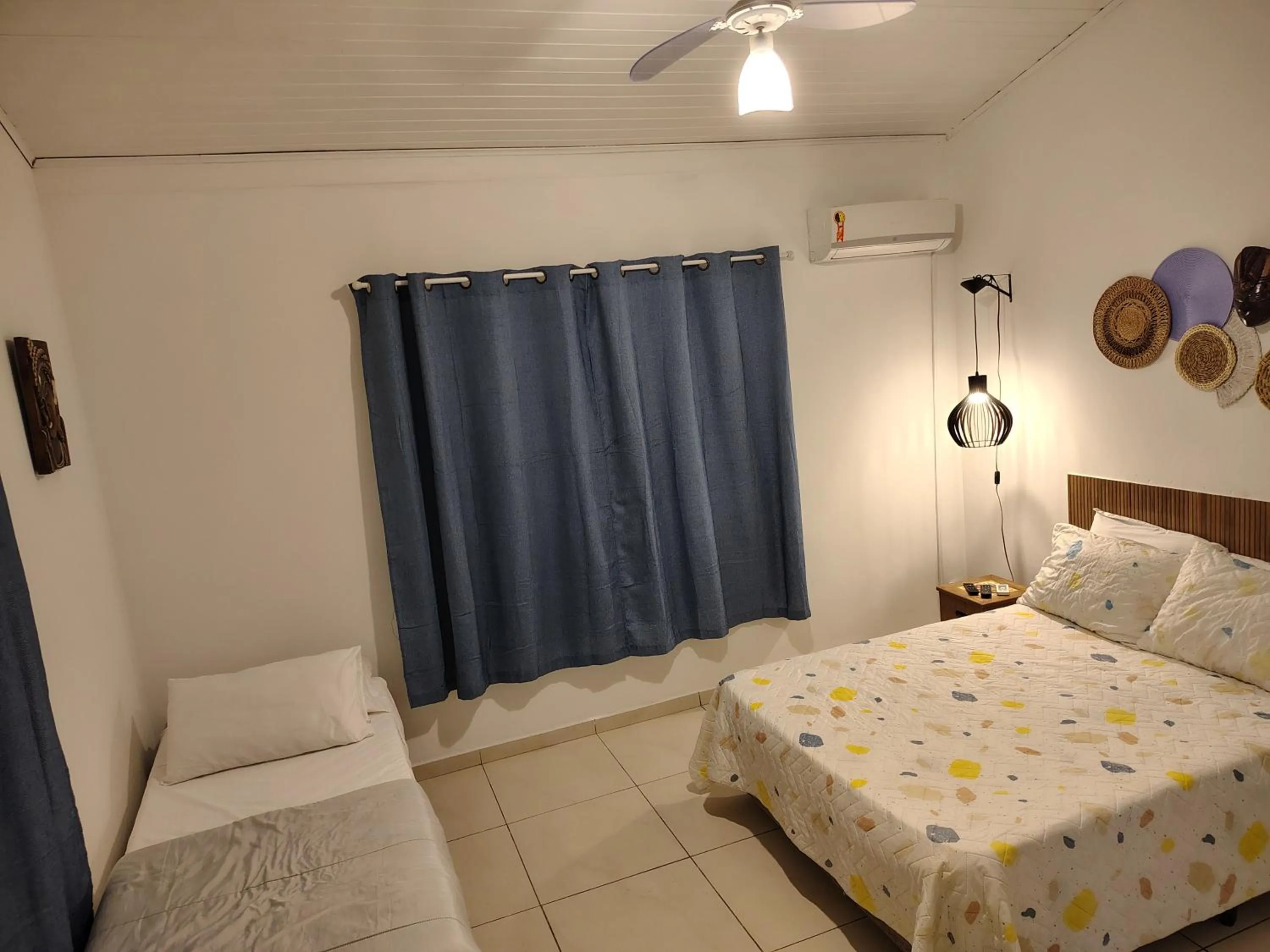 Bed in Villa Bali Maresias Lofts