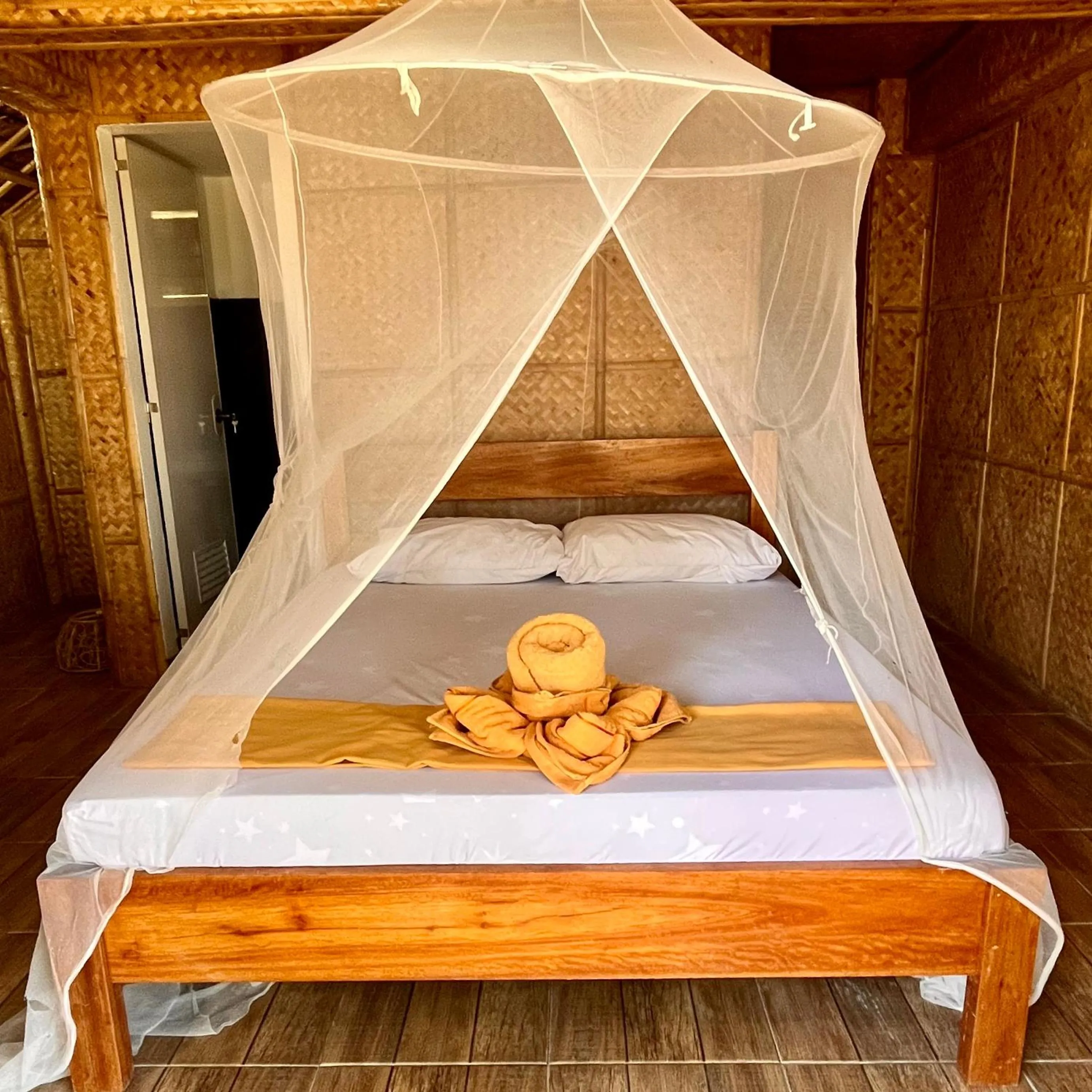 Bed in Amami Beachfront Villa with Private Beach