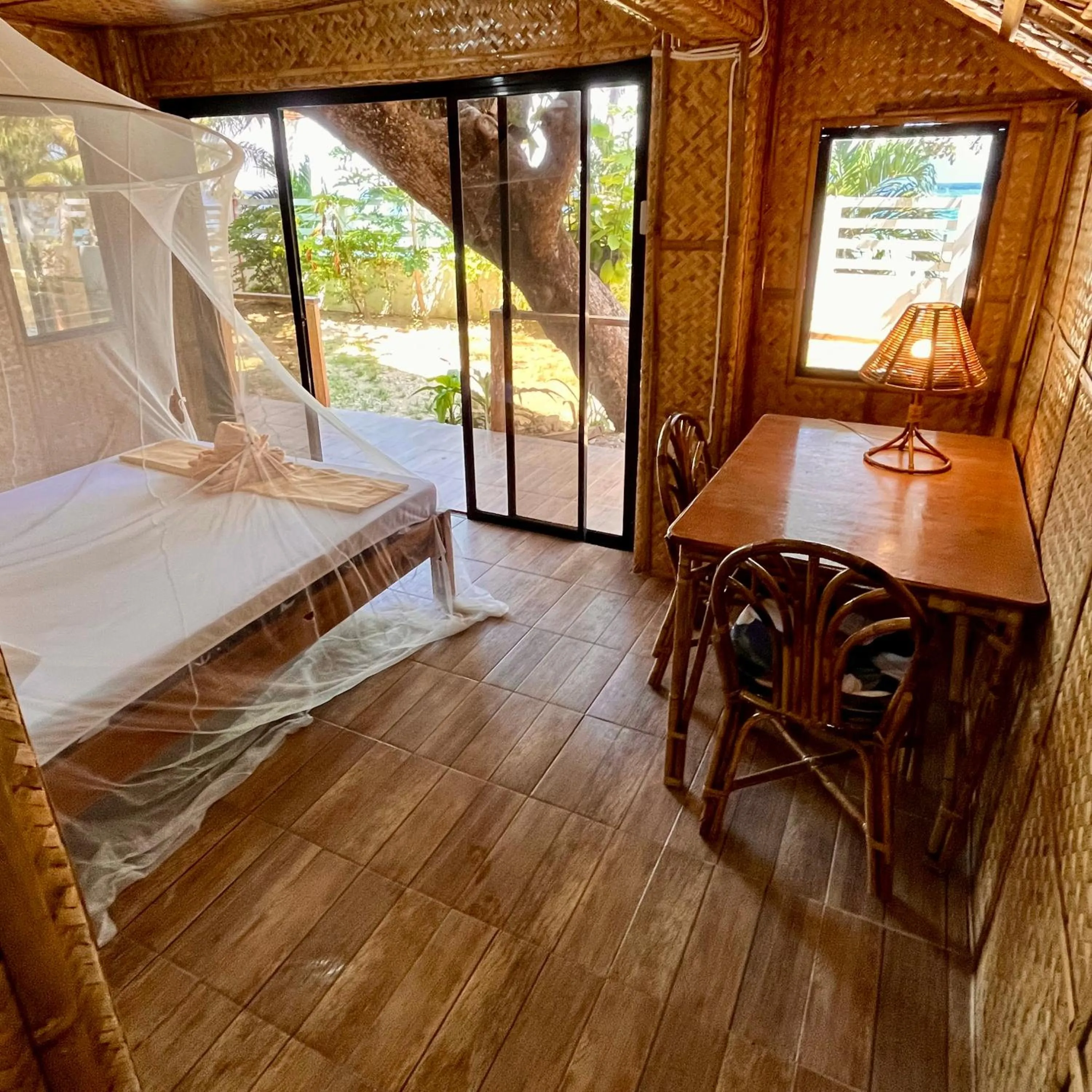 Bed in Amami Beachfront Villa with Private Beach