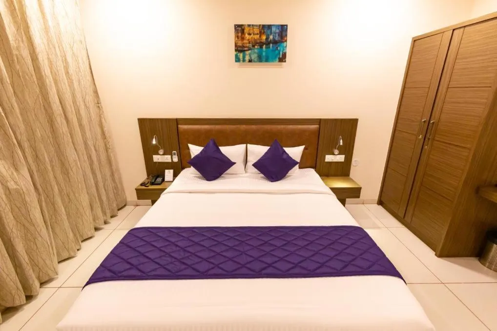 Bed in Aloka Stay Inn