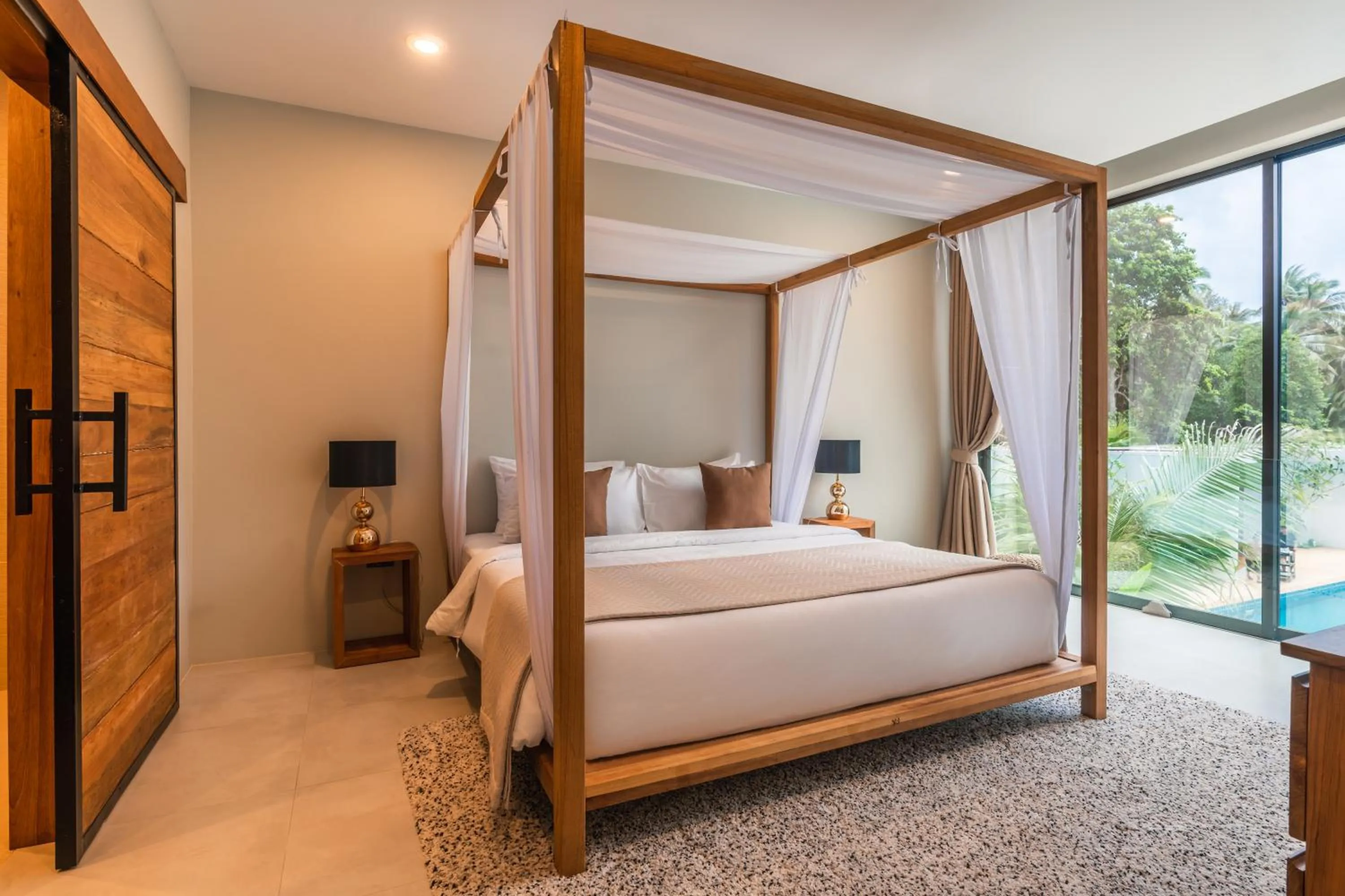 Bed in Zee Luxury Boutique Hotel