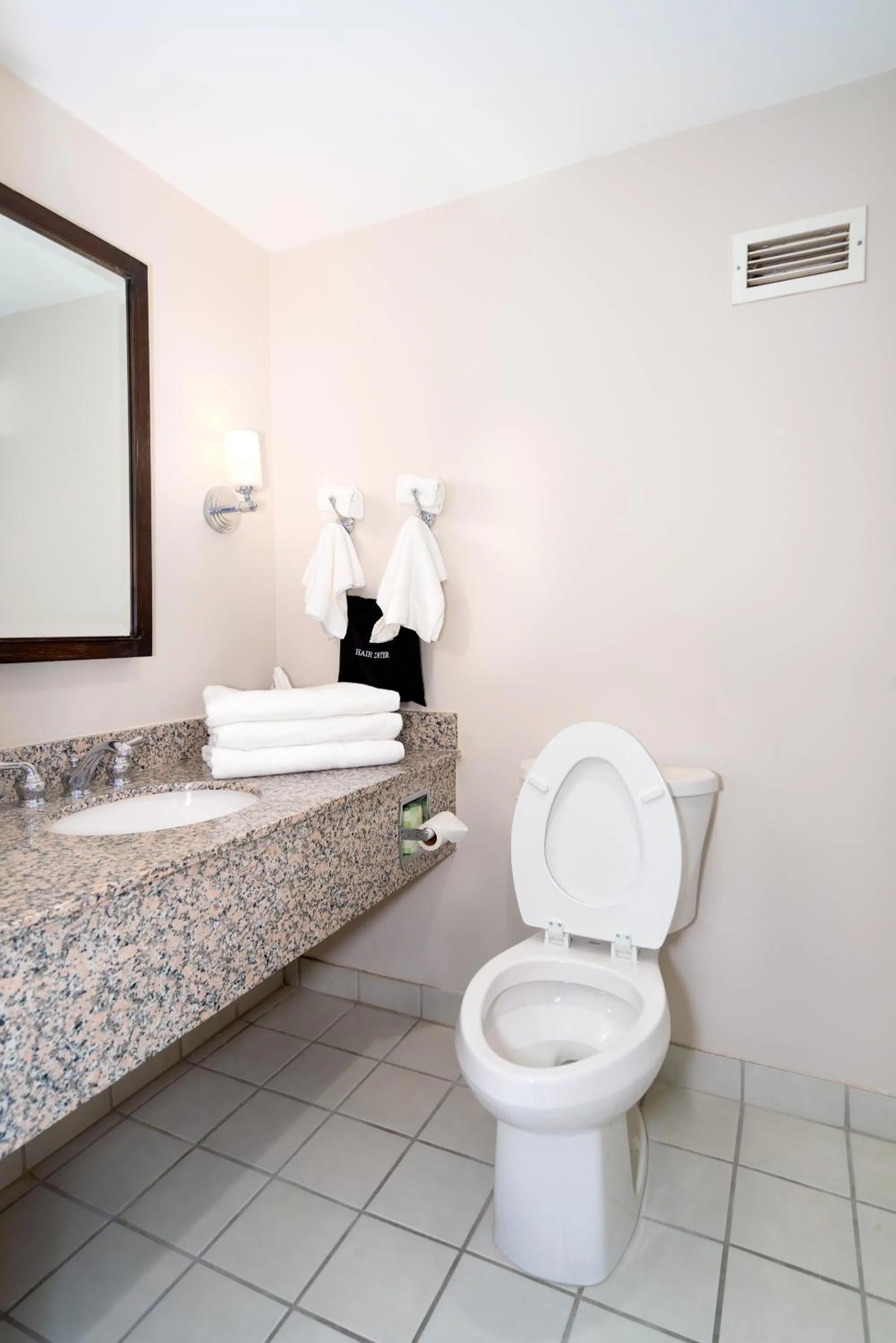 Bathroom in Bella Vista Hotel & Suites