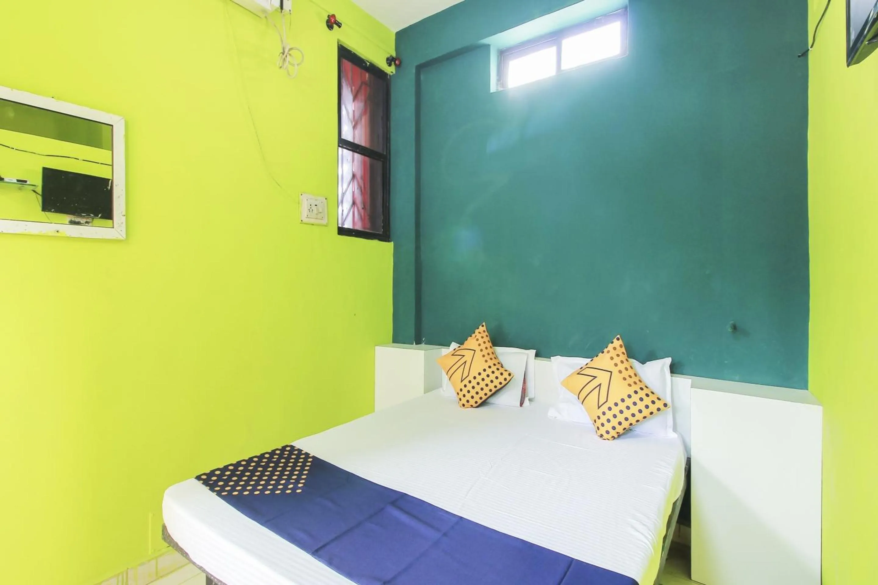 Bedroom in SPOT ON 63695 Hotel Sai Muskaan