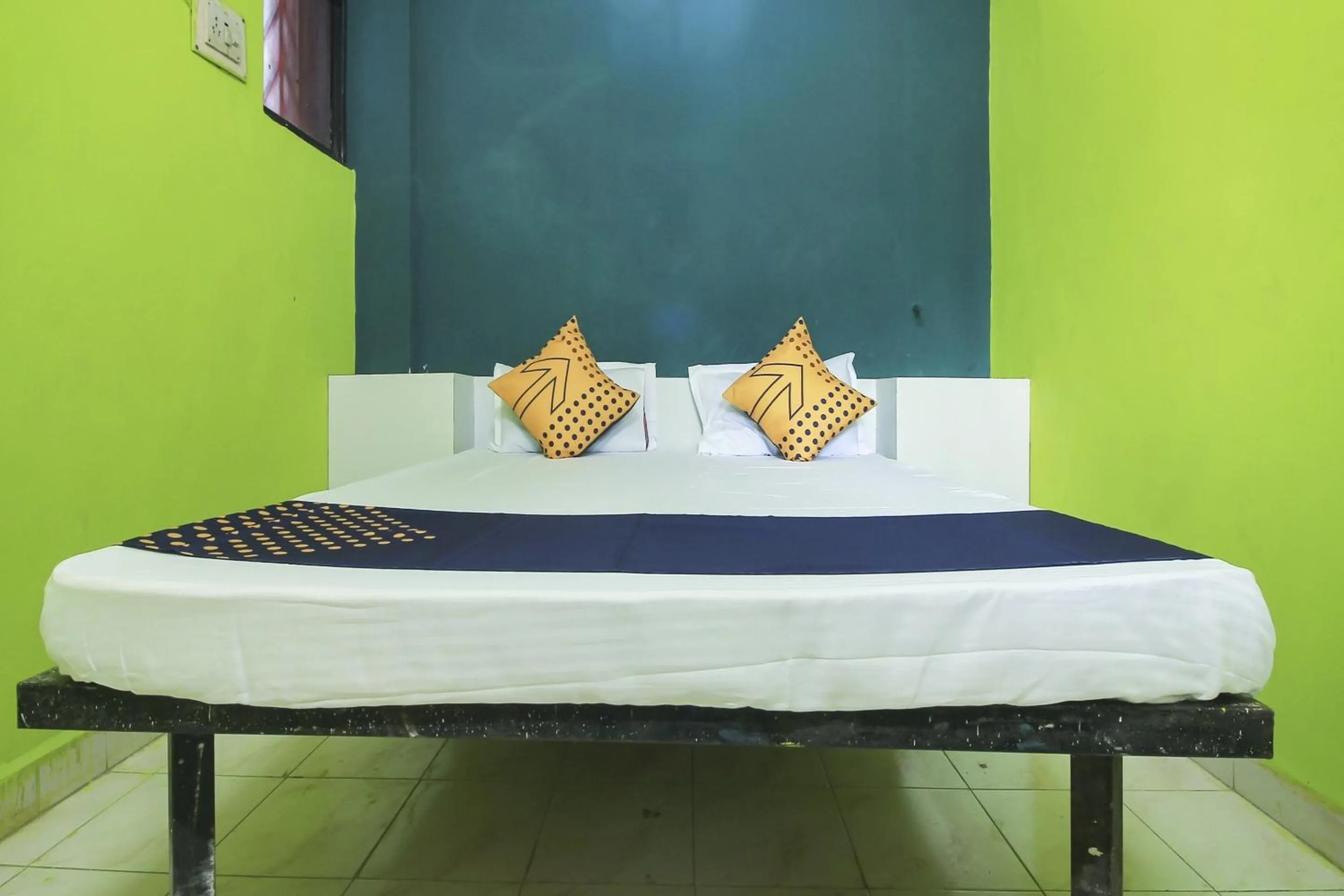 Bedroom in SPOT ON 63695 Hotel Sai Muskaan