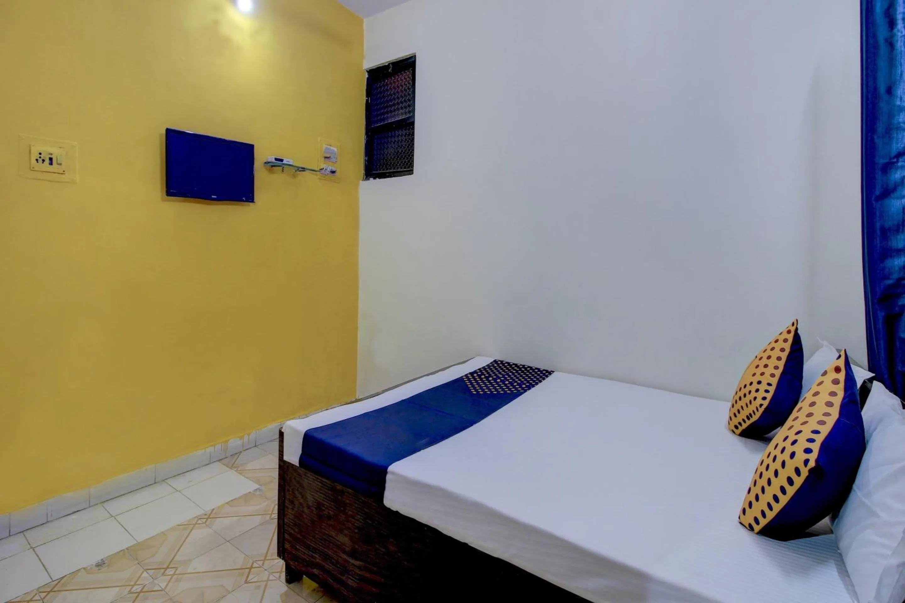 Bedroom in SPOT ON 63695 Hotel Sai Muskaan