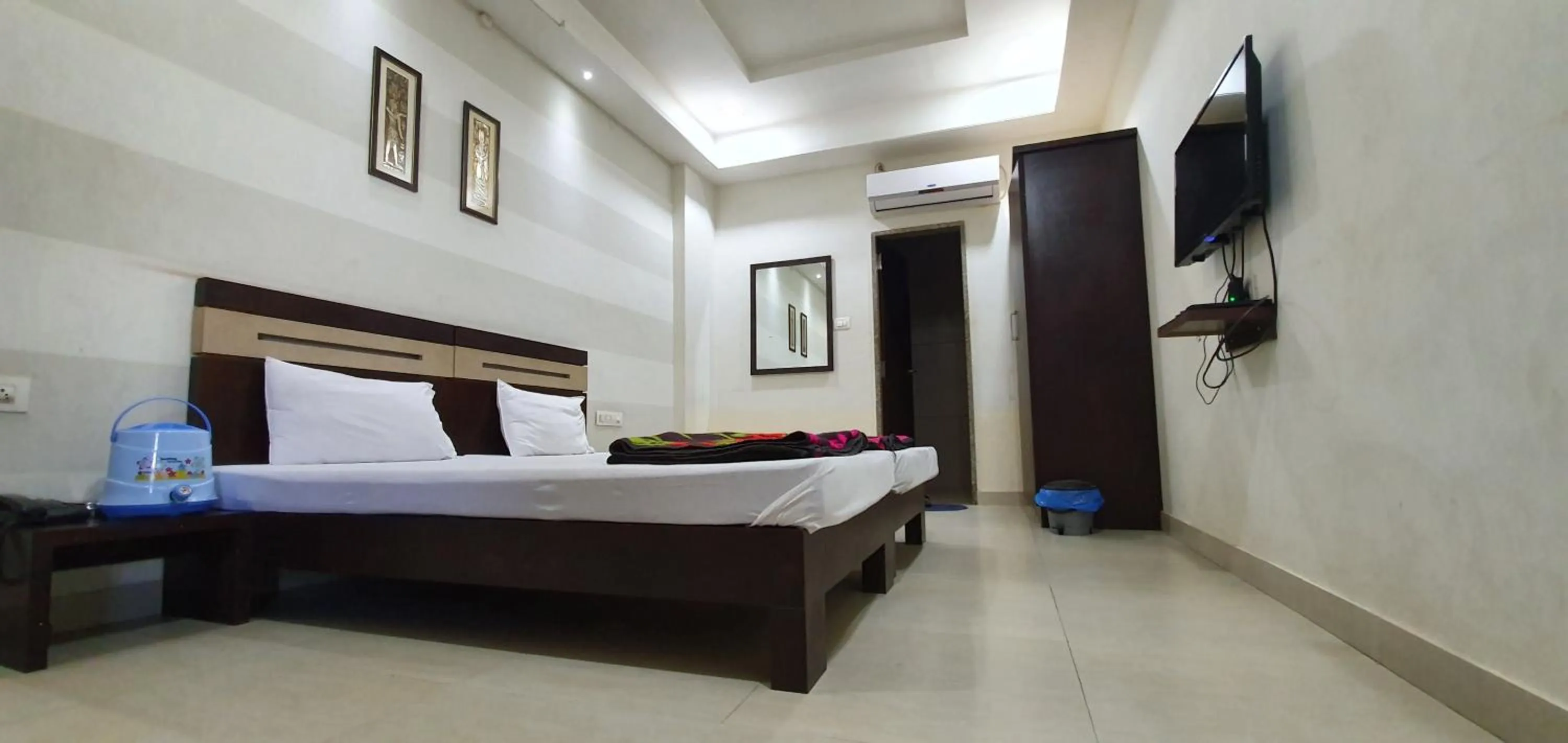 Photo of the whole room, Bed in HOTEL MANUHAR INN