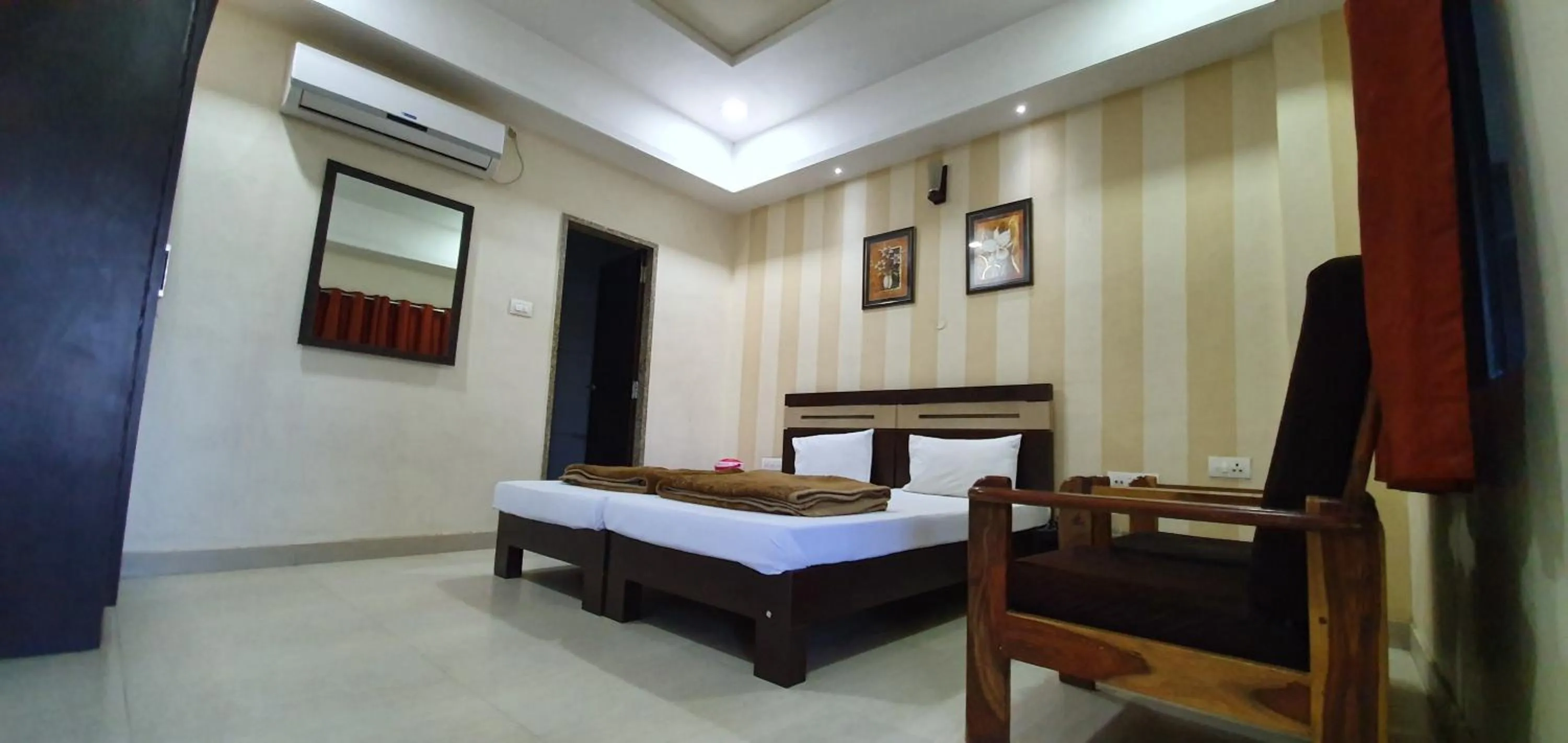 Photo of the whole room, Bed in HOTEL MANUHAR INN