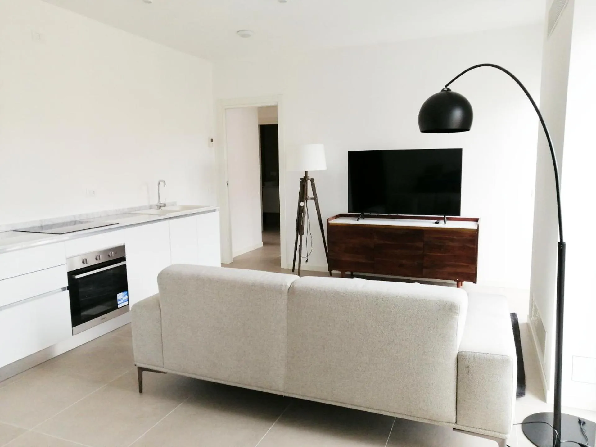 TV and multimedia in JOIVY Boutique Apartments Farneti