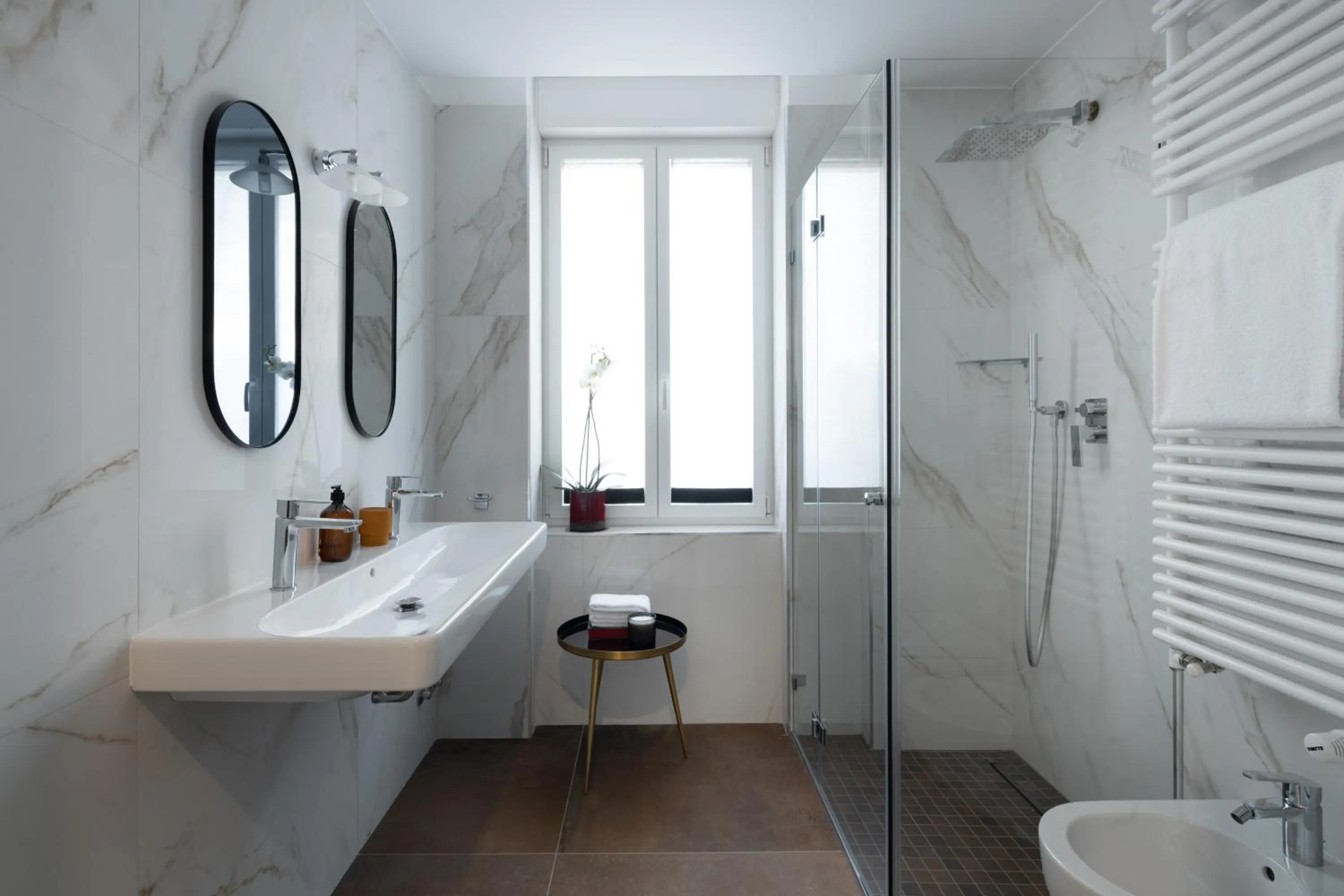 Shower in JOIVY Boutique Apartments Farneti