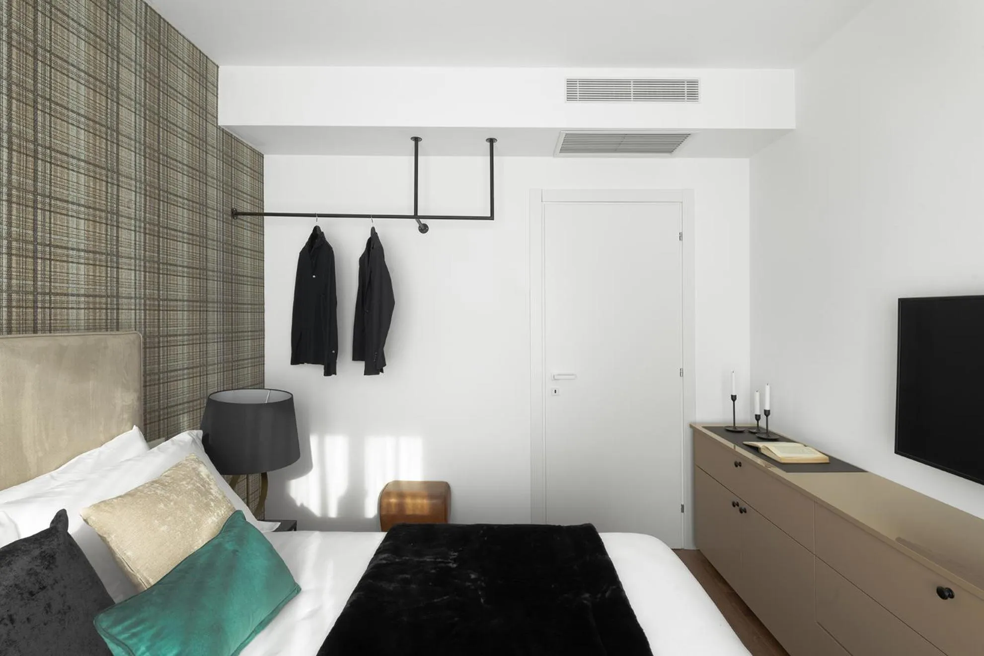 Bed in JOIVY Boutique Apartments Farneti