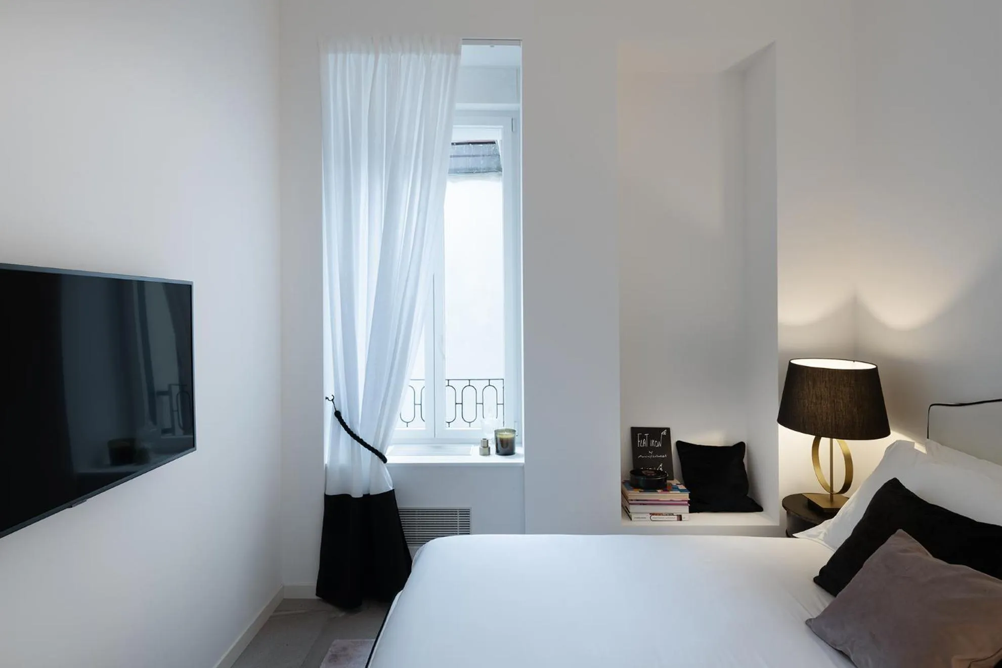 Bed in JOIVY Boutique Apartments Farneti