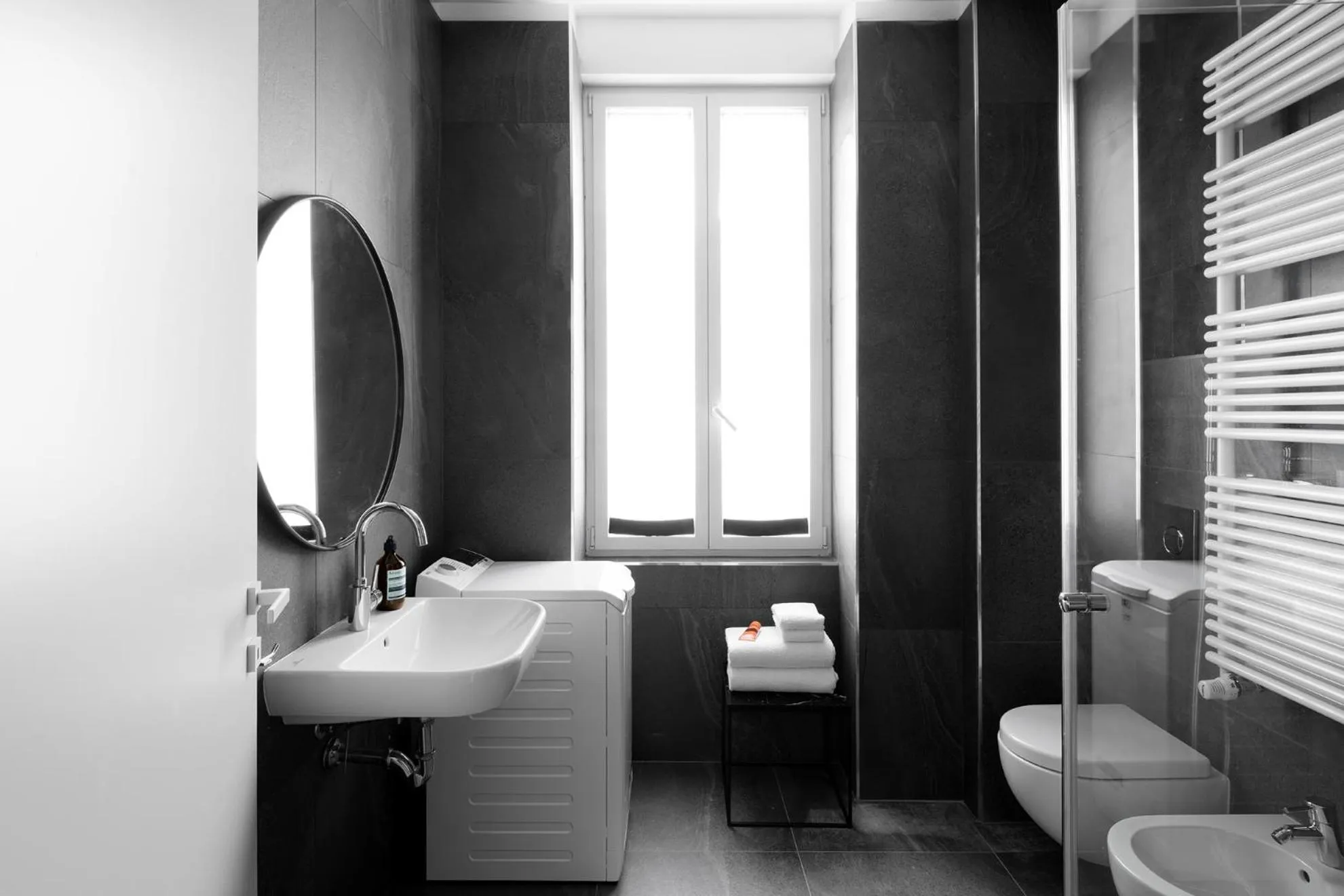 Shower in JOIVY Boutique Apartments Farneti